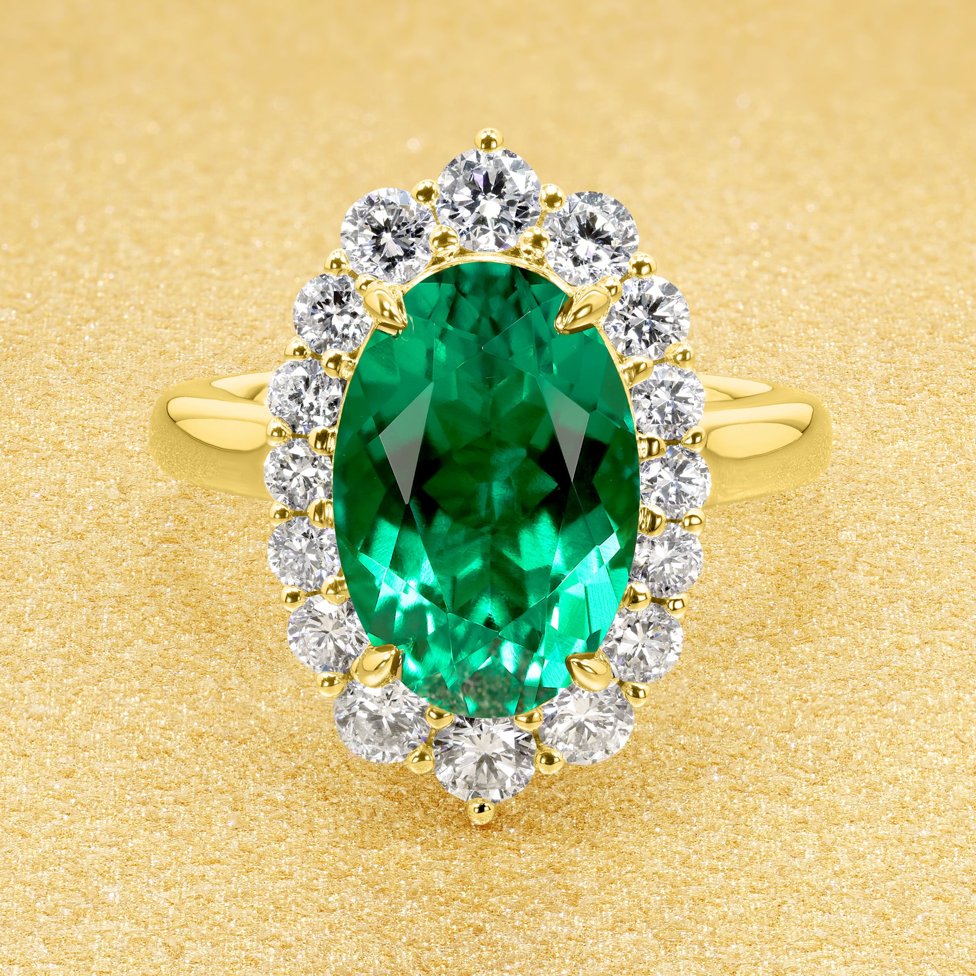 Gloria 3ct Elongated Lab-grown Oval-cut Vivid Green Emerald Halo Cathedral Engagement Ring in 14K Gold, 18K Gold, or Platinum by Earthena Jewelry of Beverly Hills.
