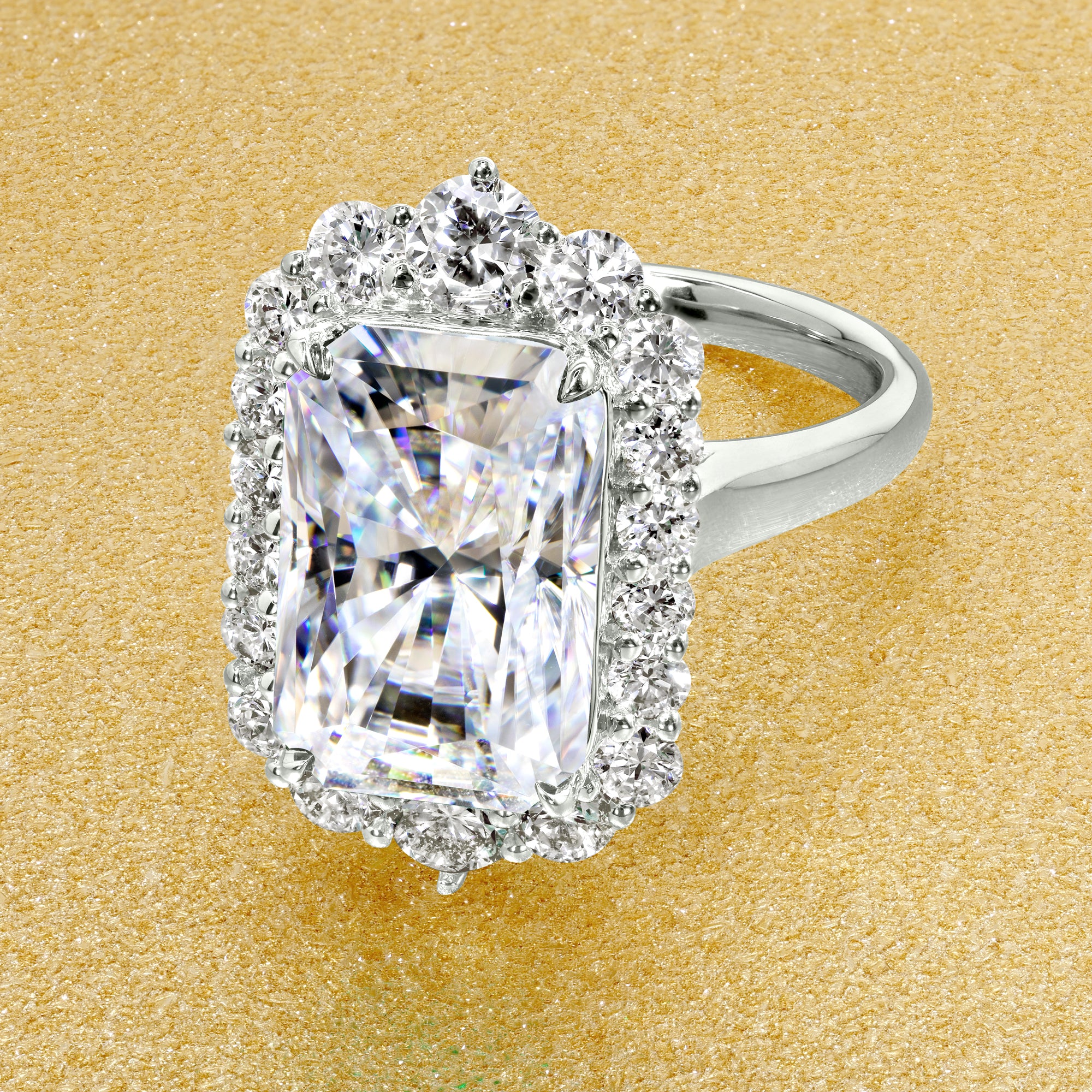 Gloria 4.5ct Elongated Radiant-cut Moissanite Halo Cathedral Engagement ring in 14K Gold, 18K Gold, or Platinum by Earthena Jewelry of Beverly Hills.