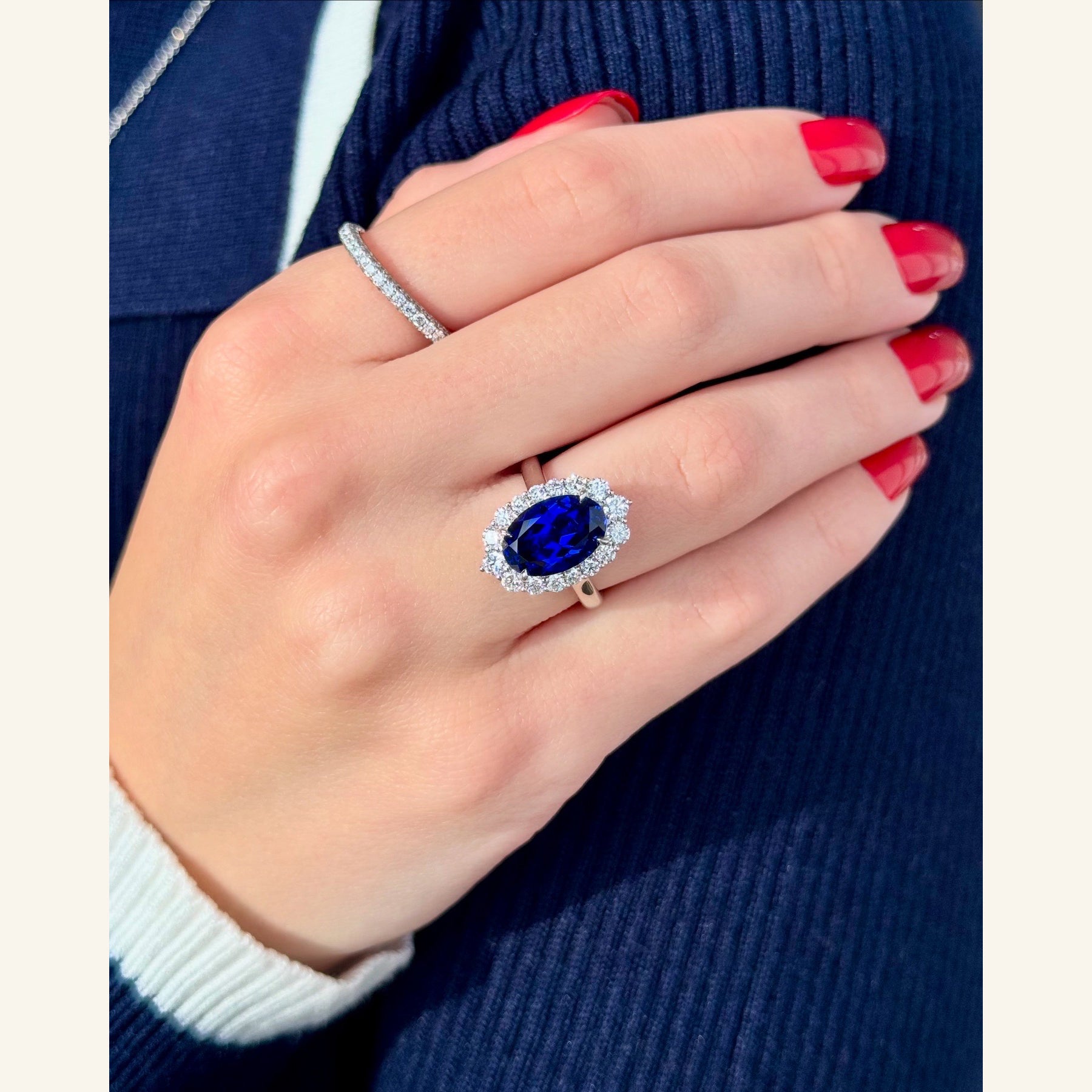 The Gloria, 4ct Elongated Oval-cut Blue Sapphire Halo Cathedral Ring by Earthena Jewelry of Beverly Hills handcrafted in Los Angeles, California.