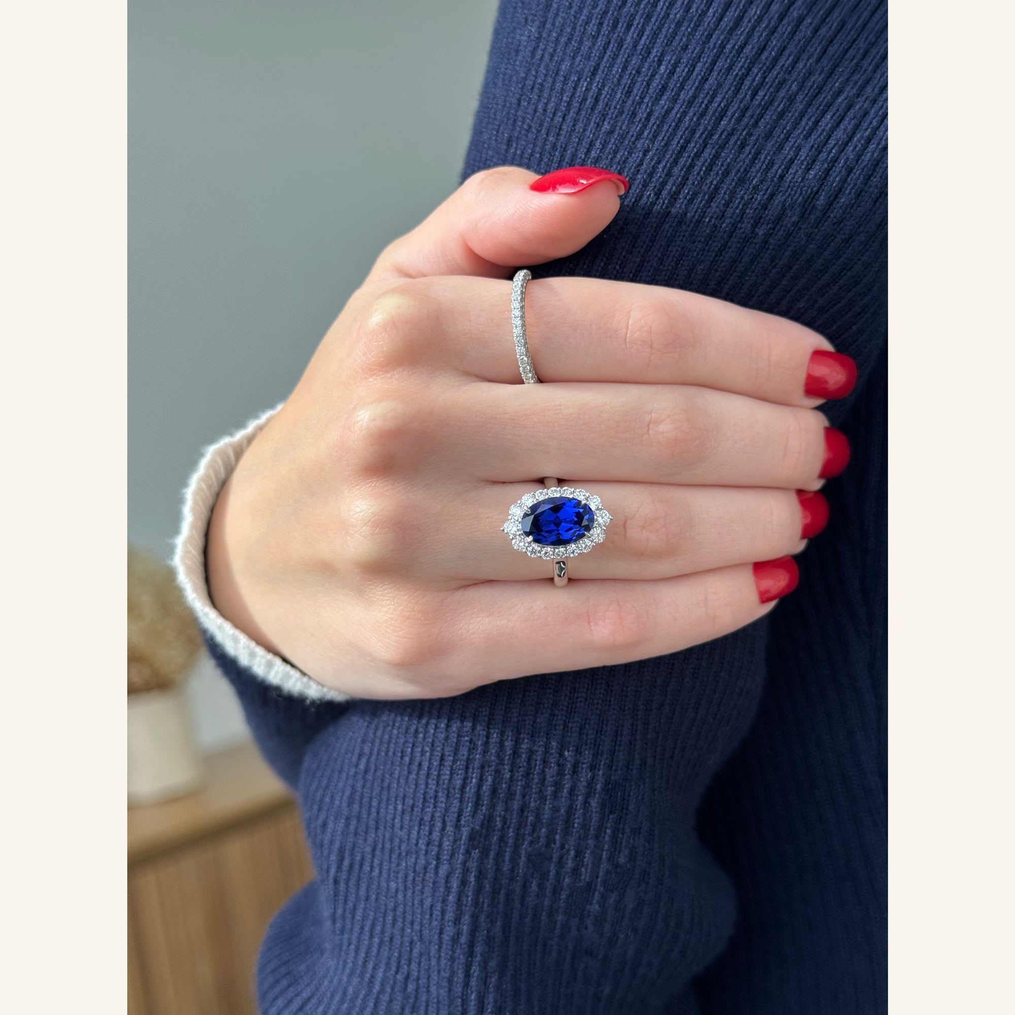 The Gloria, 4ct Elongated Oval-cut Blue Sapphire Halo Cathedral Ring by Earthena Jewelry of Beverly Hills handcrafted in Los Angeles, California.