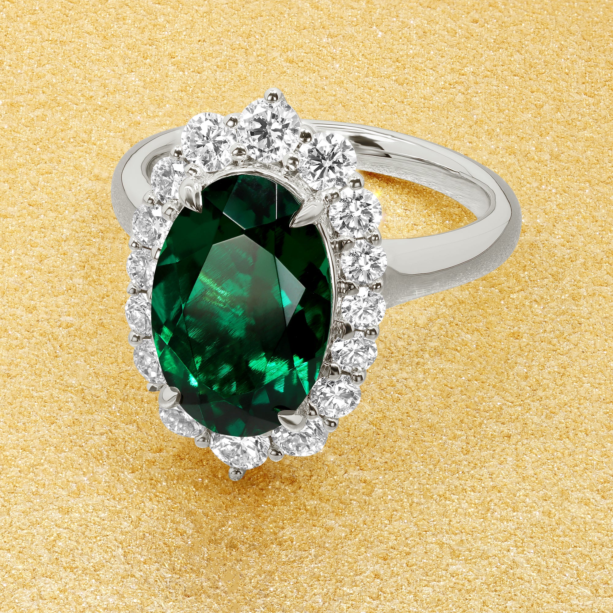Gloria 3ct Elongated Lab-grown Oval-cut Zambia Green Emerald Halo Cathedral Engagement Ring in 14K Gold, 18K Gold, or Platinum by Earthena Jewelry of Beverly Hills.