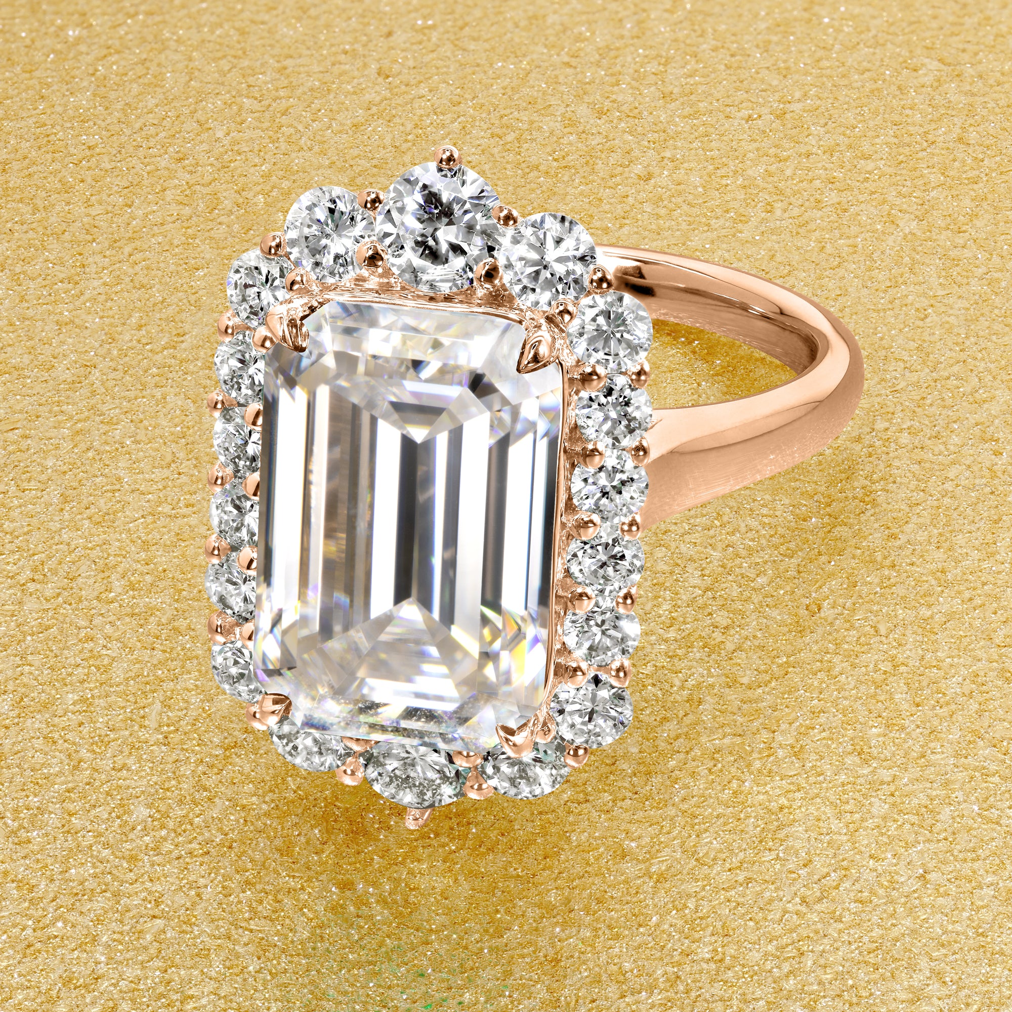 Gloria 5.5ct Elongated Emerald-Cut Moissanite Halo Cathedral Engagement Ring in 14K Gold, 18K Gold, or Platinum by Earthena Jewelry of Beverly Hills.