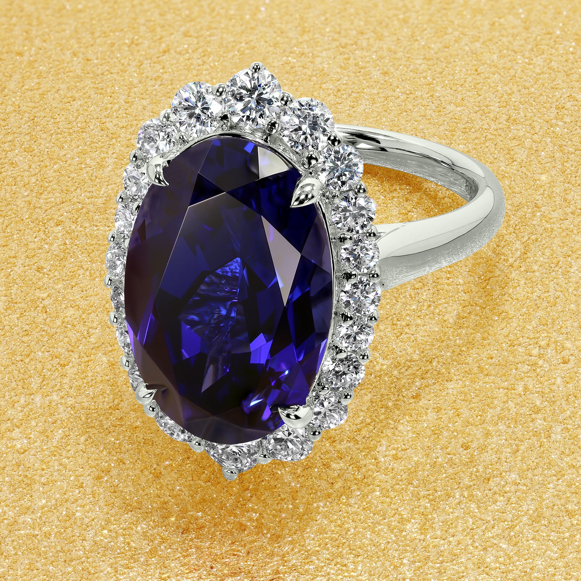 Gloria 8ct Elongated Lab-grown Oval-cut Blue Sapphire Halo Cathedral Engagement ring in 14K Gold, 18K Gold, or Platinum by Earthena Jewelry of Beverly Hills.