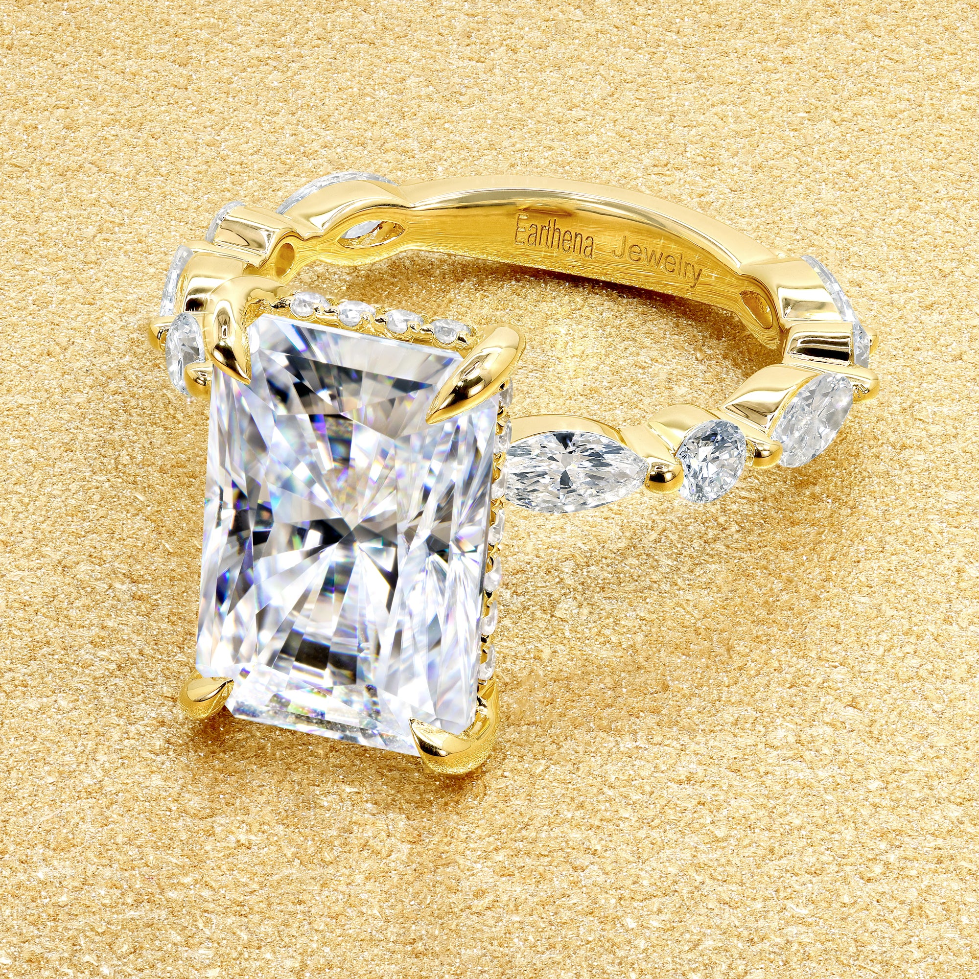 Classic Grace 4.5ct Elongated Radiant Brilliant-cut Moissanite Hidden Halo Floating Marquise and Round Lab-grown Diamond Engagement ring in 14K Gold, 18K Gold, or Platinum by Earthena Jewelry of Beverly Hills.