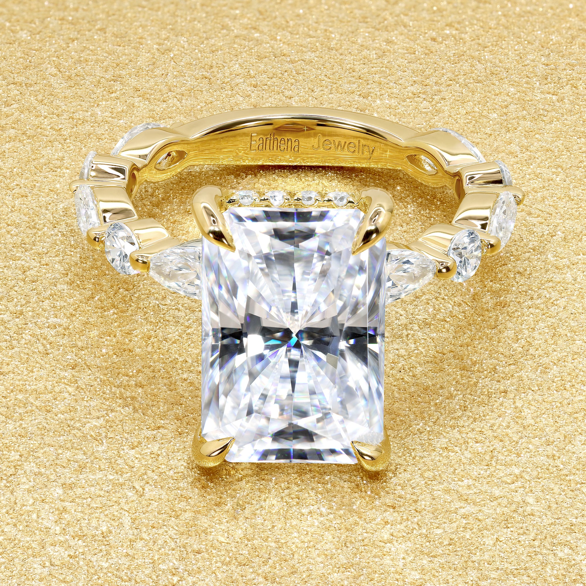 Classic Grace 4.5ct Elongated Radiant Brilliant-cut Moissanite Hidden Halo Floating Marquise and Round Lab-grown Diamond Engagement ring in 14K Gold, 18K Gold, or Platinum by Earthena Jewelry of Beverly Hills.