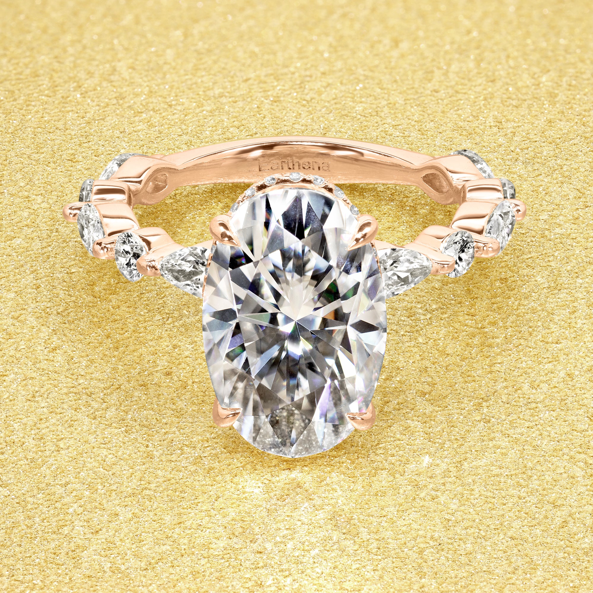 Classic Grace 4.75ct Oval Brilliant-cut Moissanite Hidden Halo Floating Marquise and Round Lab-grown Diamond Engagement ring in 14K gold, 18K gold, or Platinum handcrafted in Los Angeles by Earthena Jewelry.