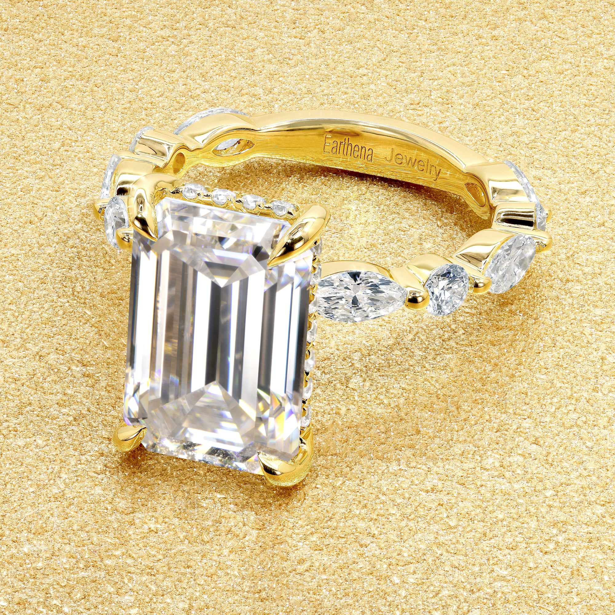 Classic Grace 5.5ct Emerald-cut Moissanite Hidden Halo Floating Marquise and Round Lab-grown Diamond Engagement ring in 14K Gold, 18K Gold, or Platinum by Earthena Jewelry of Beverly Hills.