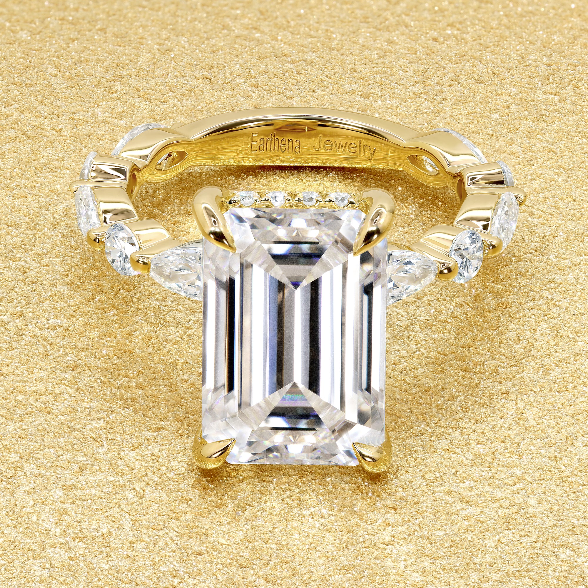 Classic Grace 5.5ct Emerald-cut Moissanite Hidden Halo Floating Marquise and Round Lab-grown Diamond Engagement ring in 14K Gold, 18K Gold, or Platinum by Earthena Jewelry of Beverly Hills.