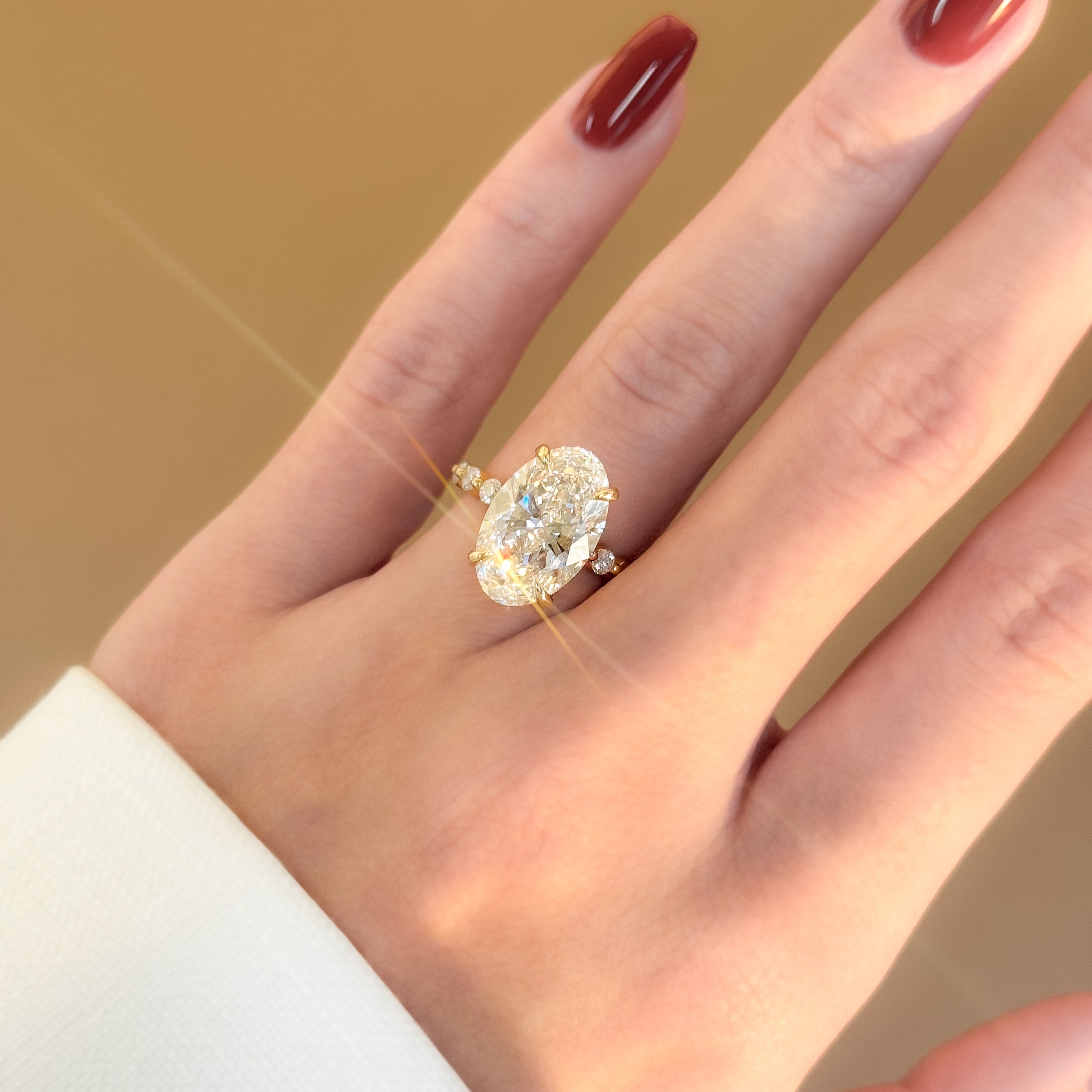 Classic Luna 4.78ct Elongated Oval-cut Lab-grown Diamond Hidden Halo Floating Engagement ring in 18K Yellow Gold by Earthena Jewelry of Beverly Hills.