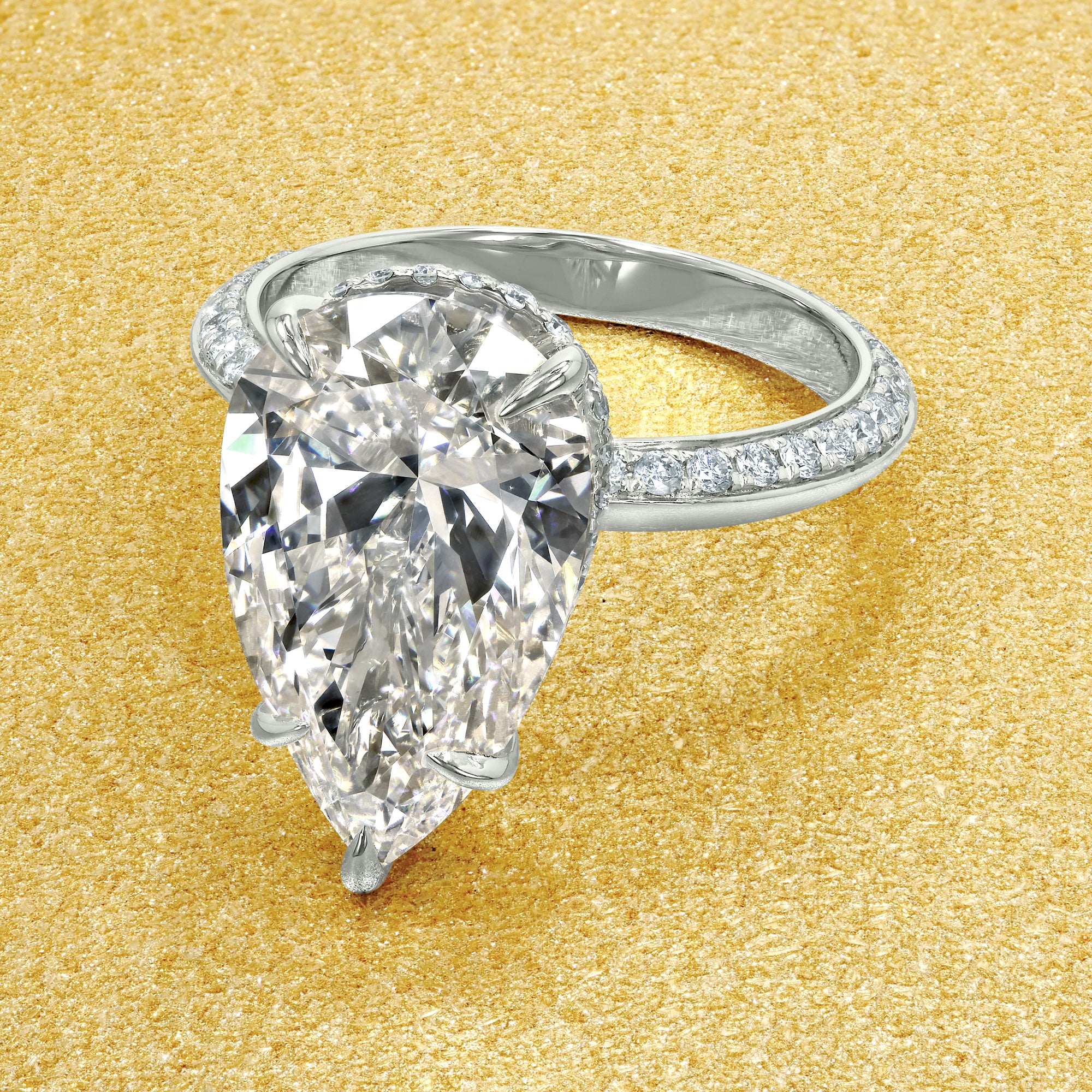 Axis 5ct Pear-Shaped Lab-Grown Diamond Knife-Edge Engagement Ring in 14K Gold, 18K Gold, or Platinum by Earthena Jewelry of Beverly Hills.