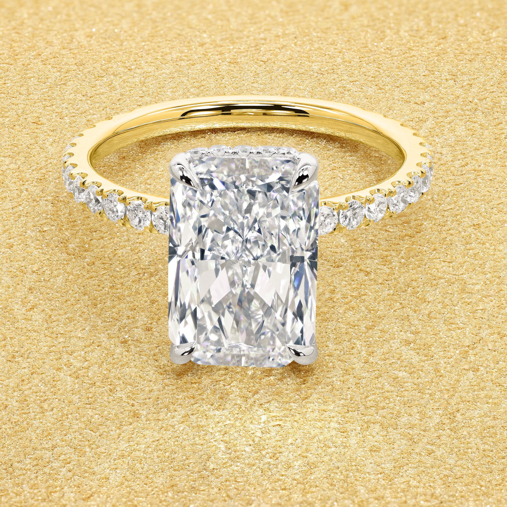 Classic Selina 3.21ct Elongated Radiant-cut Lab-grown Diamond Hidden Vow Halo Engagement ring in 14K Two-toned Gold by Earthena Jewelry of Beverly Hills.