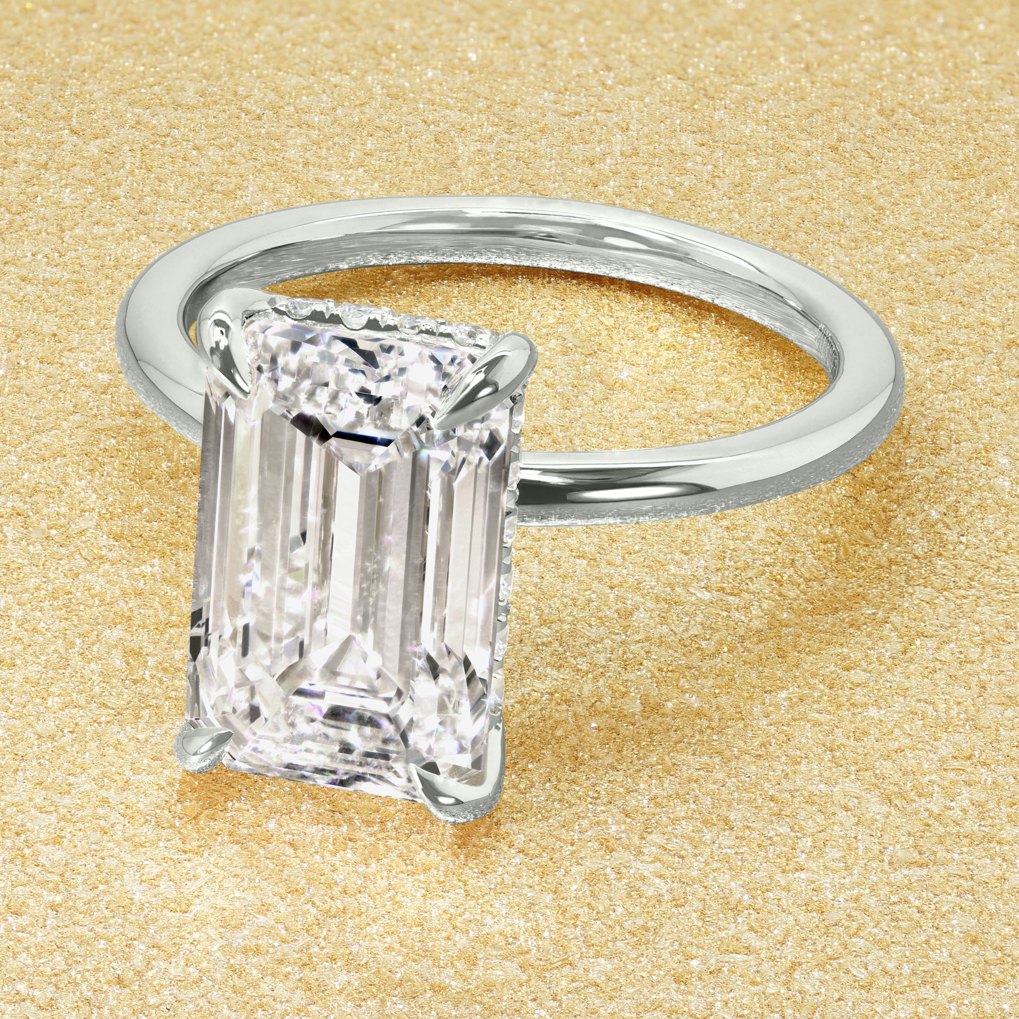Classic Adara 4.02ct Elongated Emerald-cut Lab-grown Diamond Hidden Halo Engagement ring in 14K Gold, 18K Gold, or Platinum by Earthena Jewelry of Beverly Hills.