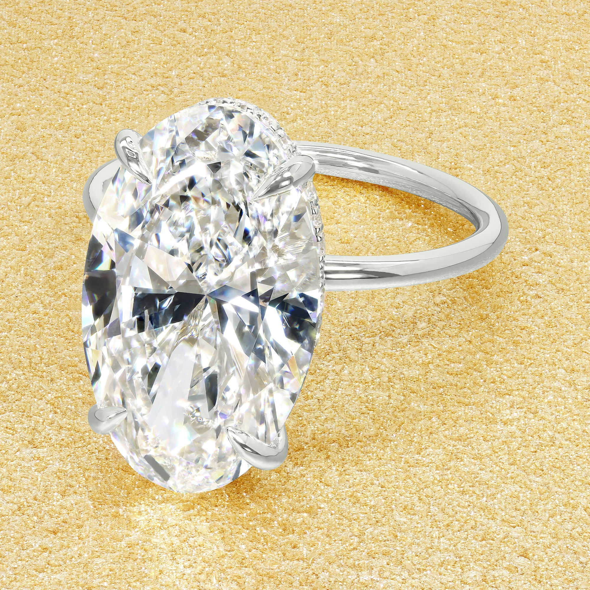 Classic Ariela 6.23ct Elongated Oval-cut Lab-grown Diamond Hidden Eternity Halo Engagement ring in 14K gold, 18K gold, or Platinum by Earthena Jewelry of Beverly Hills.