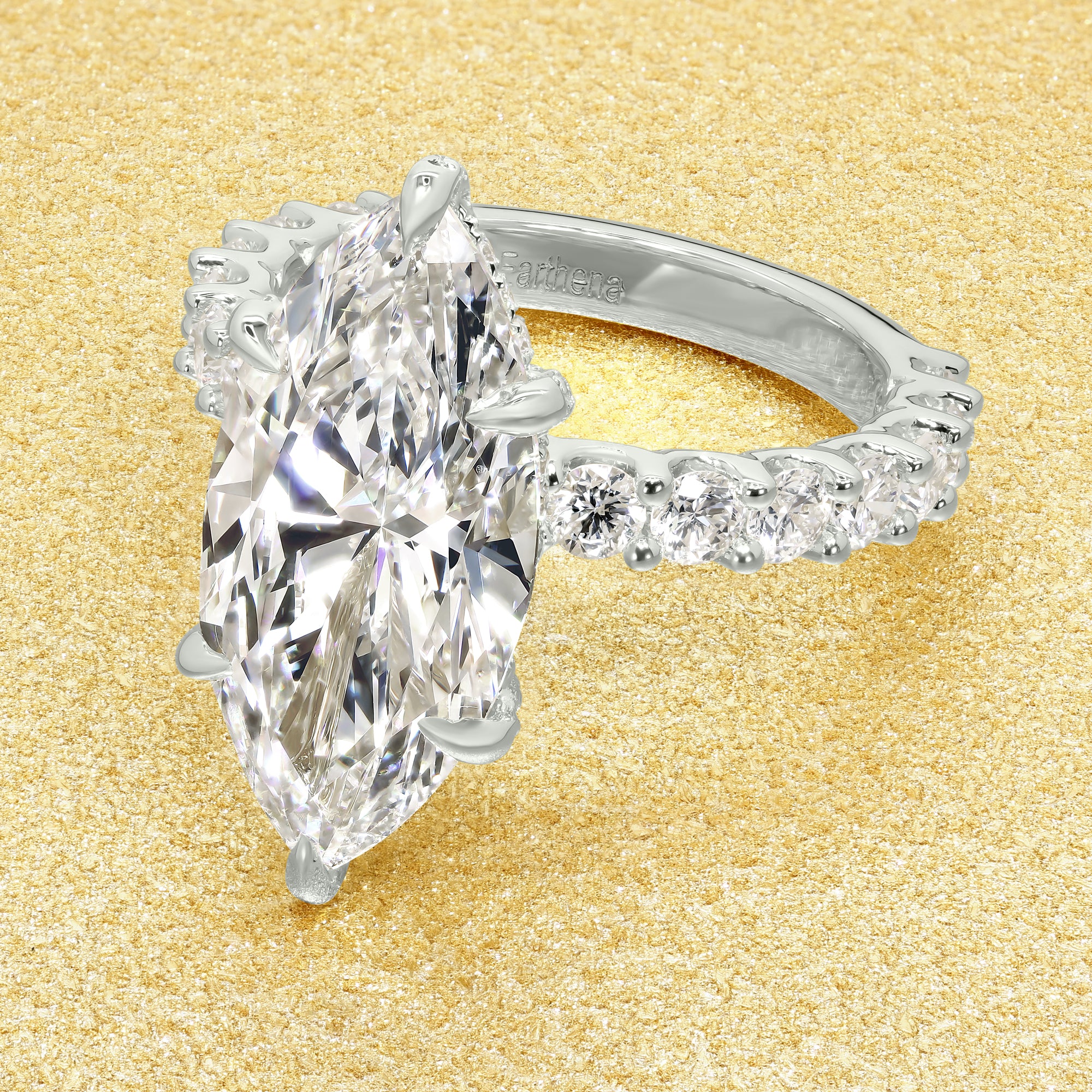 Inspired by Selena Gomez engagement ring, this Bespoke Mila 4.45ct Elongated Marquise-cut Lab-grown Diamond Hidden Wrap Halo Engagement ring are available in 14K gold, 18K gold, or Platinum by Earthena Jewelry of Beverly Hills.
