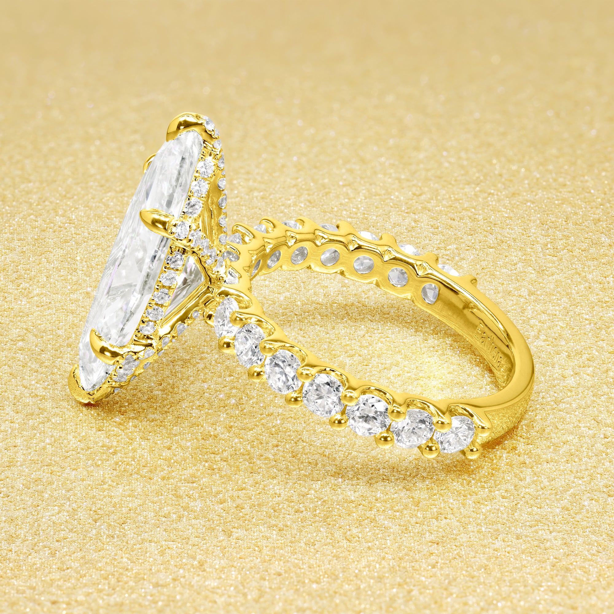 Inspired by Selena Gomez engagement ring, this Bespoke Mila 4.45ct Elongated Marquise-cut Lab-grown Diamond Hidden Wrap Halo Engagement ring are available in 14K gold, 18K gold, or Platinum by Earthena Jewelry of Beverly Hills.