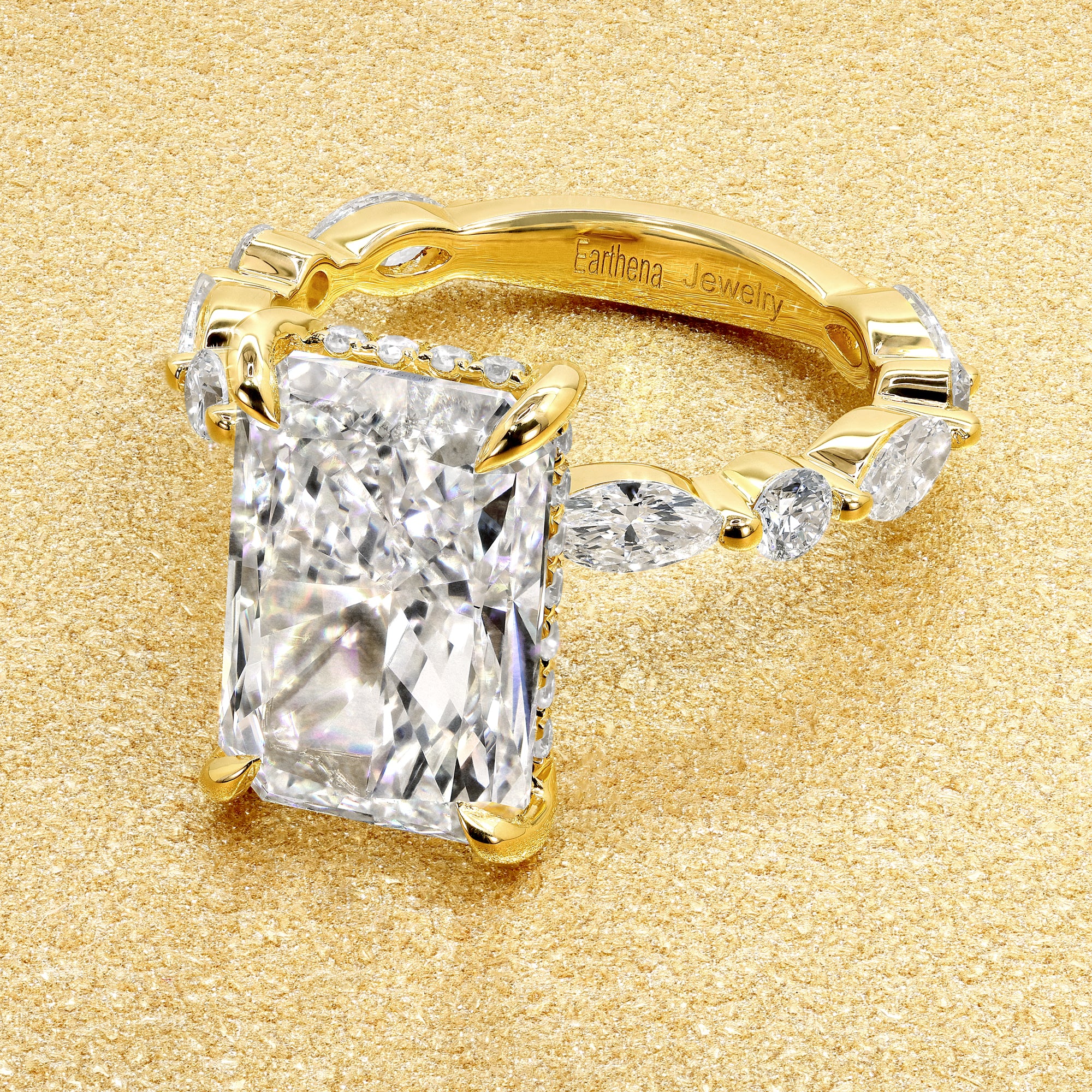 Classic Grace 4.57ct Elongated Radiant-cut Lab-grown Diamond Hidden Halo Floating Engagement ring in 14K or 18K Yellow Gold by Earthena Jewelry of Beverly Hills.
