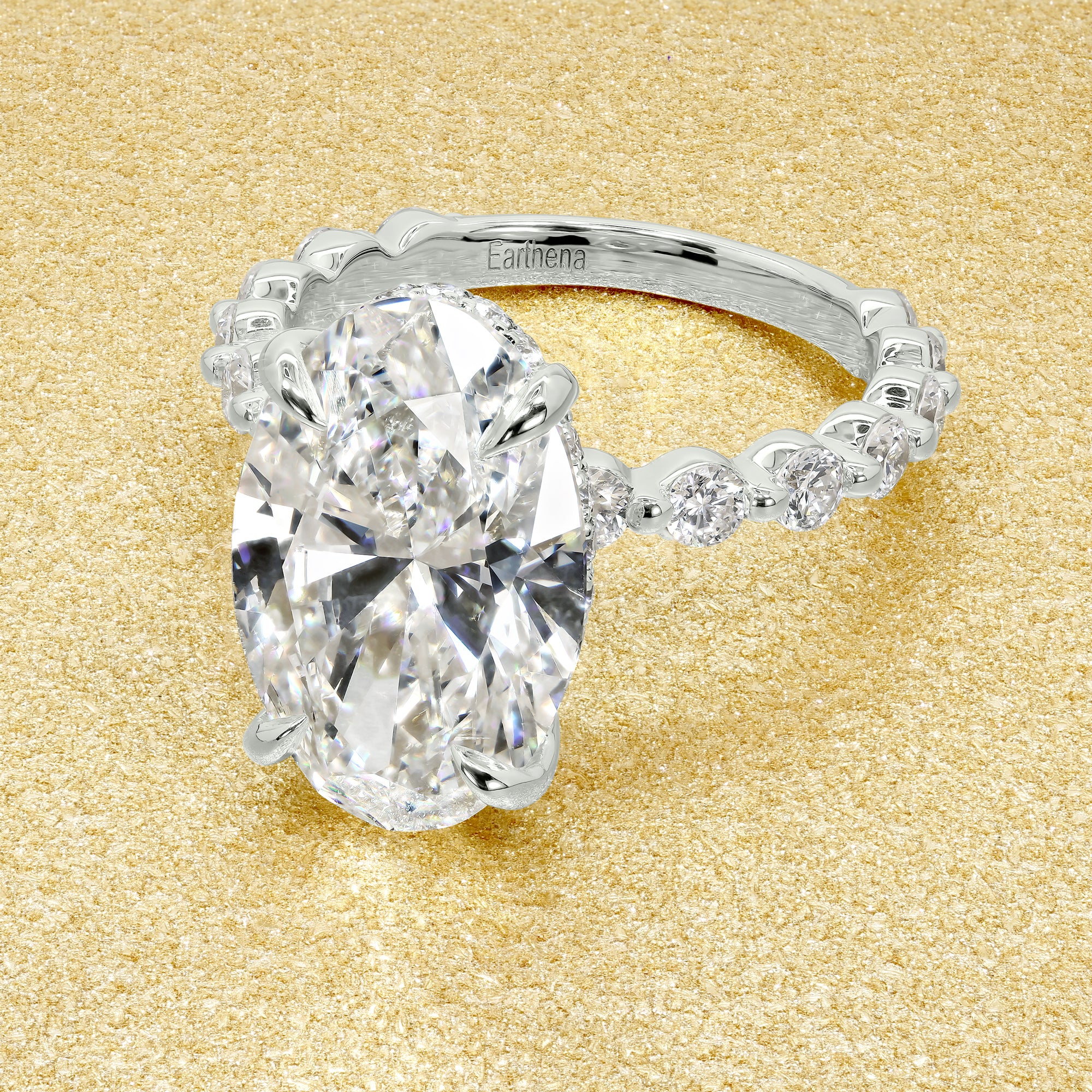 Classic Luna 4.78ct Elongated Oval-cut Lab-grown Diamond Hidden Halo Floating Engagement ring in 18K Yellow Gold by Earthena Jewelry of Beverly Hills.