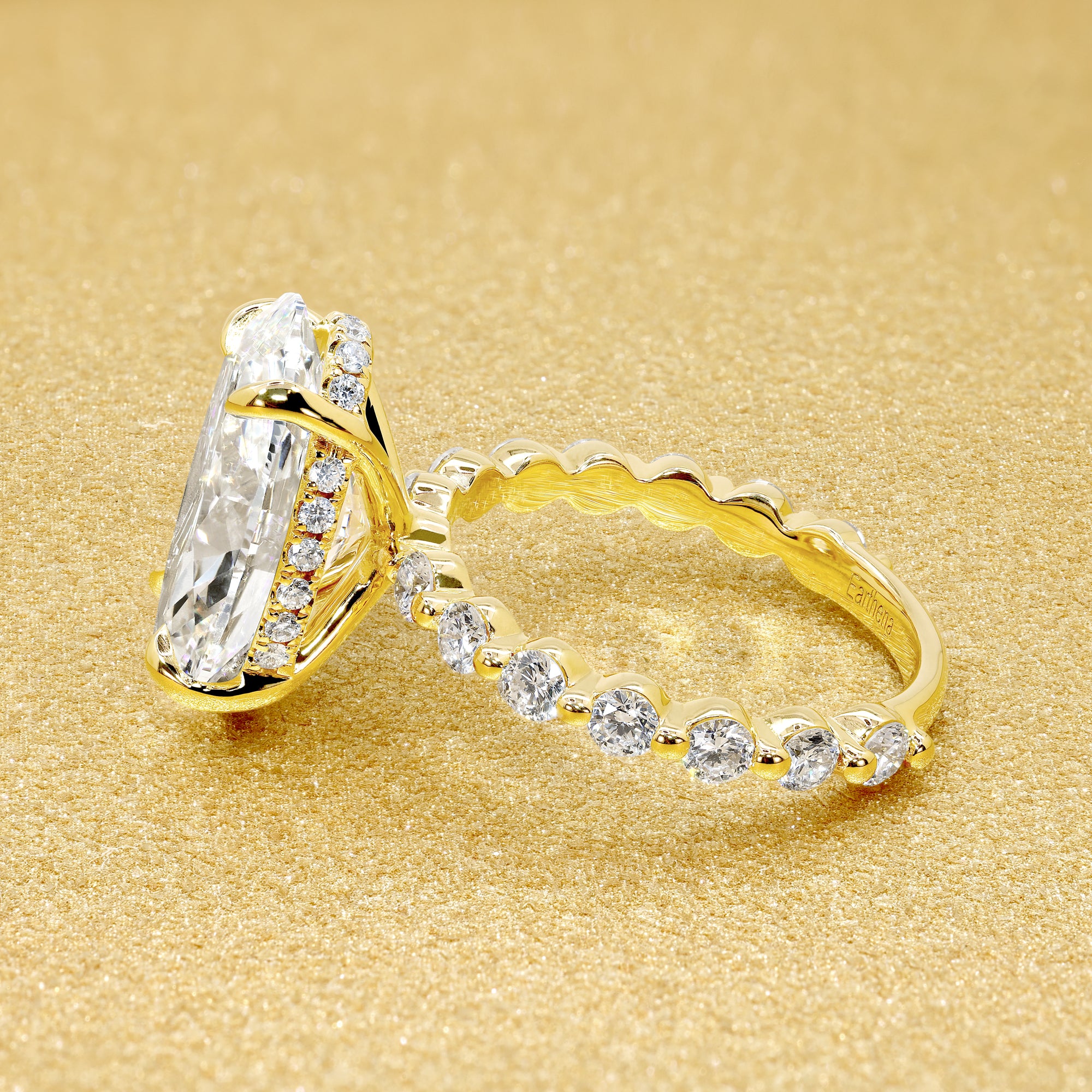 Classic Luna 4.78ct Elongated Oval-cut Lab-grown Diamond Hidden Halo Floating Engagement ring in 18K Yellow Gold by Earthena Jewelry of Beverly Hills.