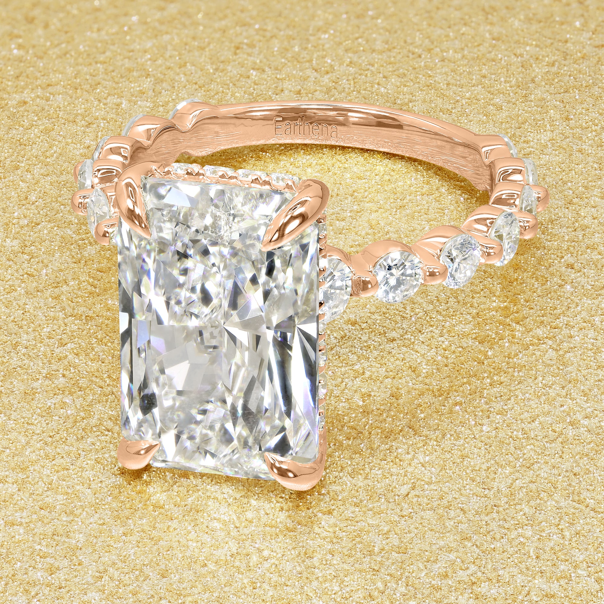 Classic Luna 5.25ct Elongated Radiant-cut Lab-grown Diamond Hidden Halo Floating Engagement ring in 14K Gold, 18K Gold, or Platinum by Earthena Jewelry of Beverly Hills.