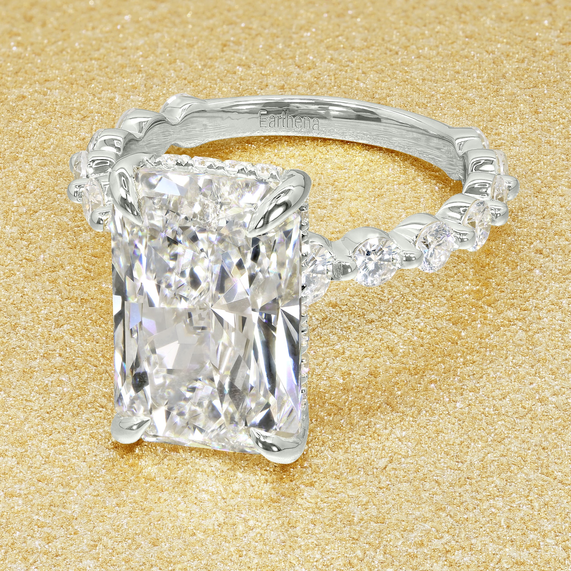 Classic Luna 5.25ct Elongated Radiant-cut Lab-grown Diamond Hidden Halo Floating Engagement ring in 14K Gold, 18K Gold, or Platinum by Earthena Jewelry of Beverly Hills.