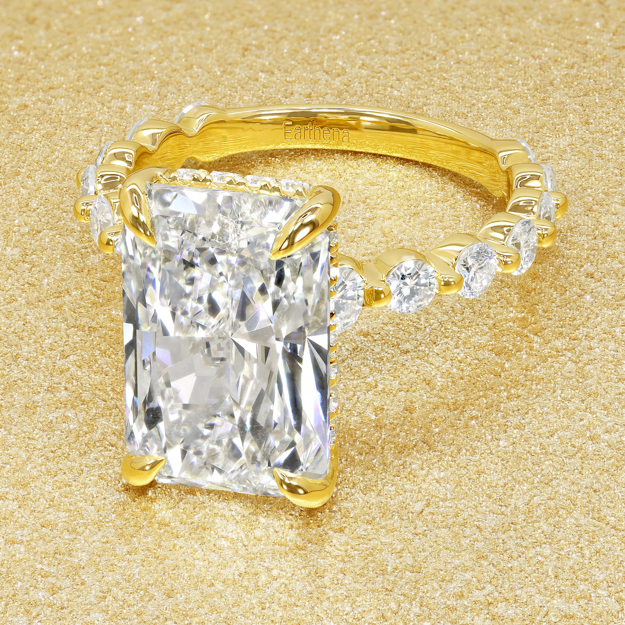 Classic Luna 5.25ct Elongated Radiant-cut Lab-grown Diamond Hidden Halo Floating Engagement ring in 14K Gold, 18K Gold, or Platinum by Earthena Jewelry of Beverly Hills.