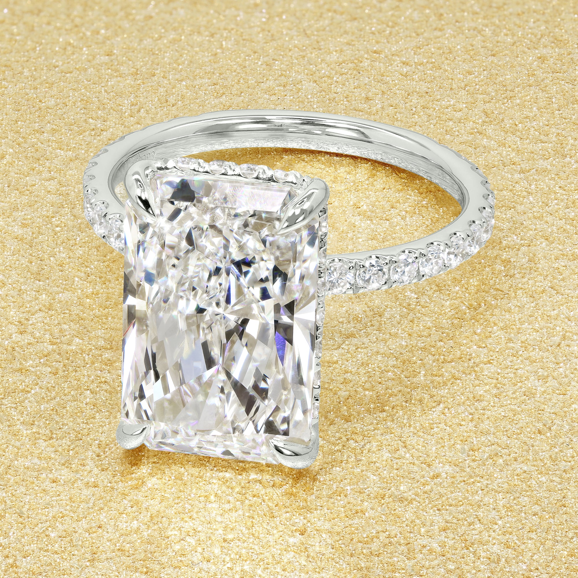 Classic Selina 5.05ct Elongated Radiant-cut Lab-grown Diamond Hidden Halo Engagement ring in 14K gold, 18K gold, or Platinum by Earthena Jewelry of Beverly Hills.