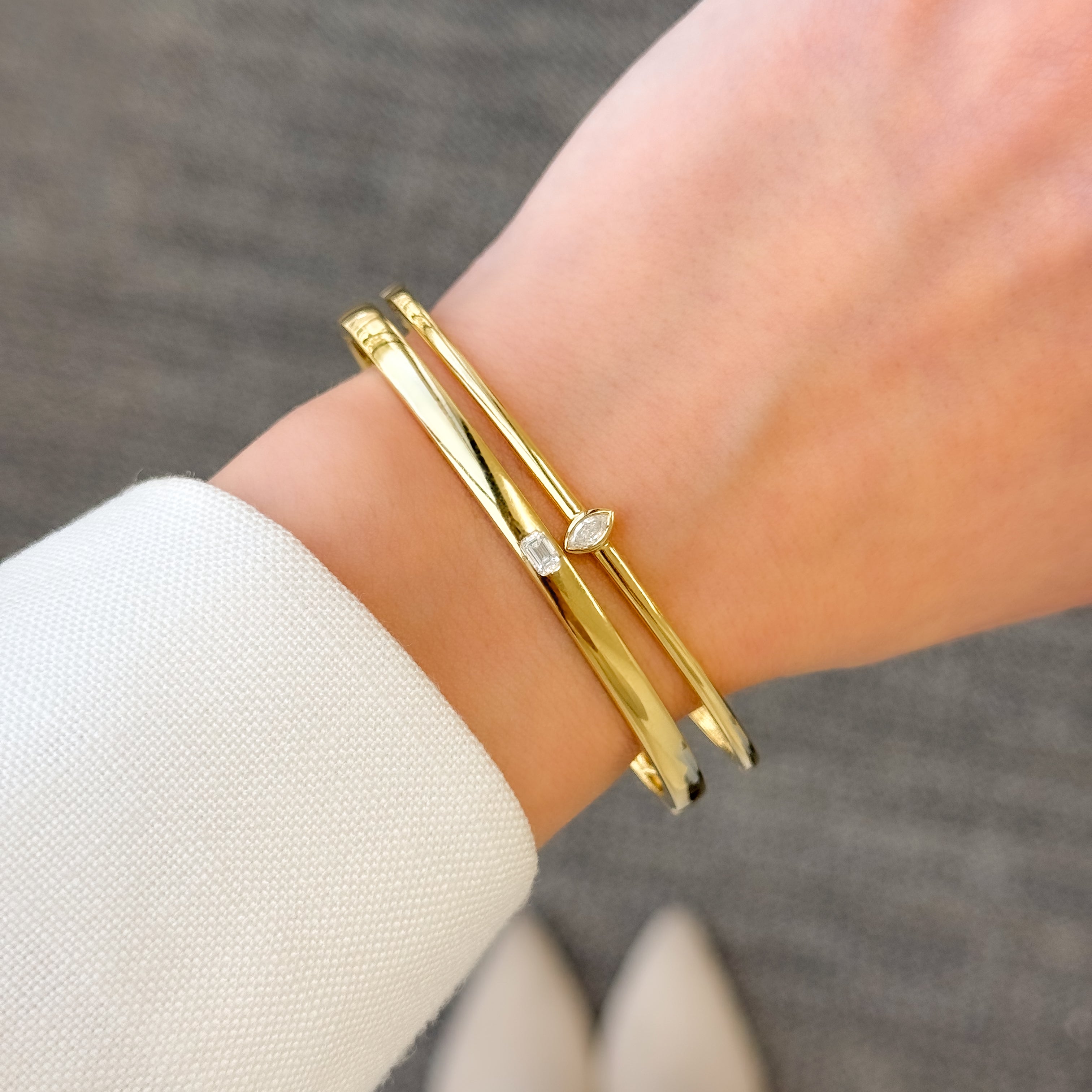 The Fiona, Marquise-cut Lab-grown and Natural diamond Bezel Solitaire Bangle handcrafted 14K gold, 18K gold and Platinum by Earthena Jewelry of Beverly Hills.