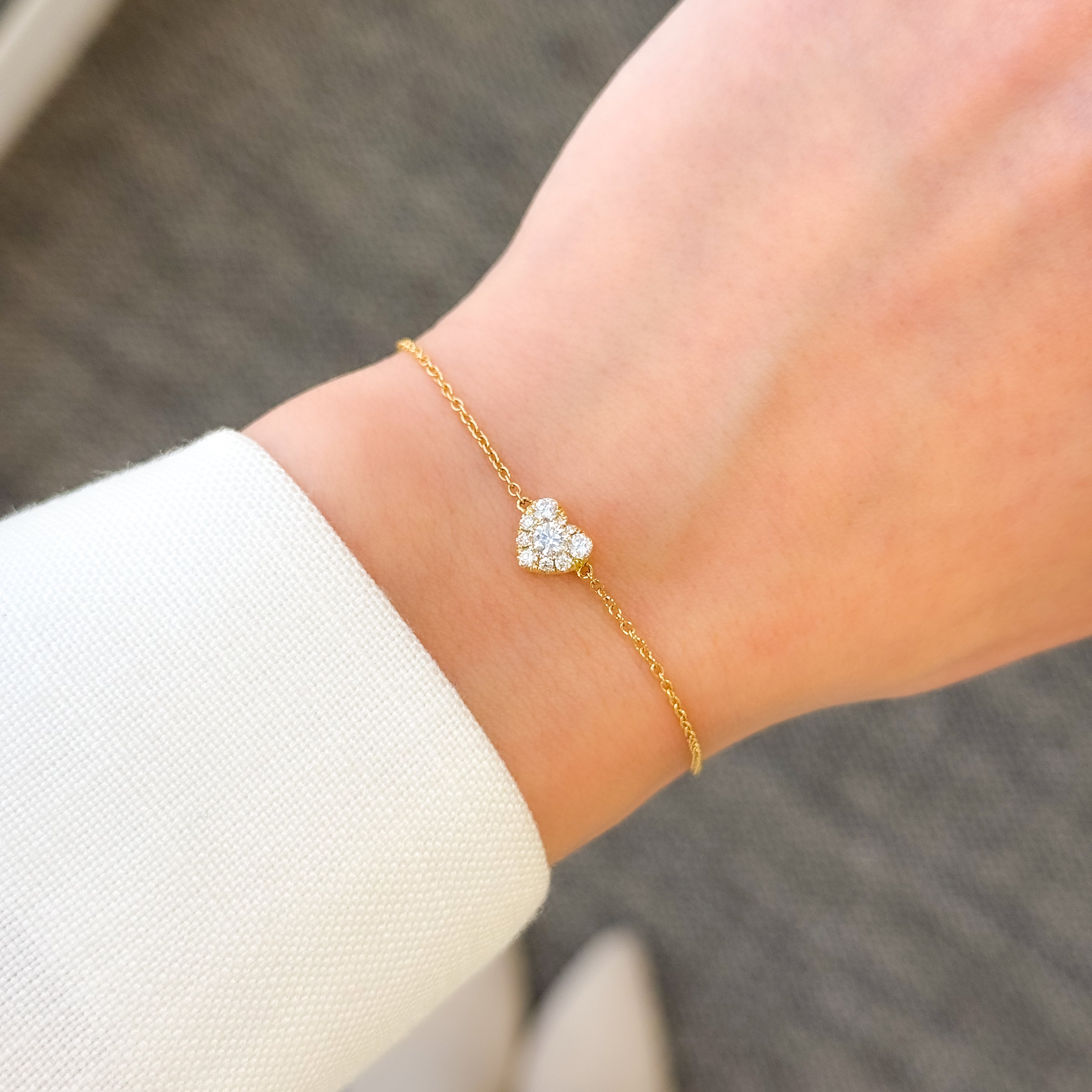 The Alia, Cluster Heart Shaped Diamond Adjustable Stackable Bracelet in 14K Gold, 18K Gold or Platinum by Earthena Jewelry of Beverly Hills, California.