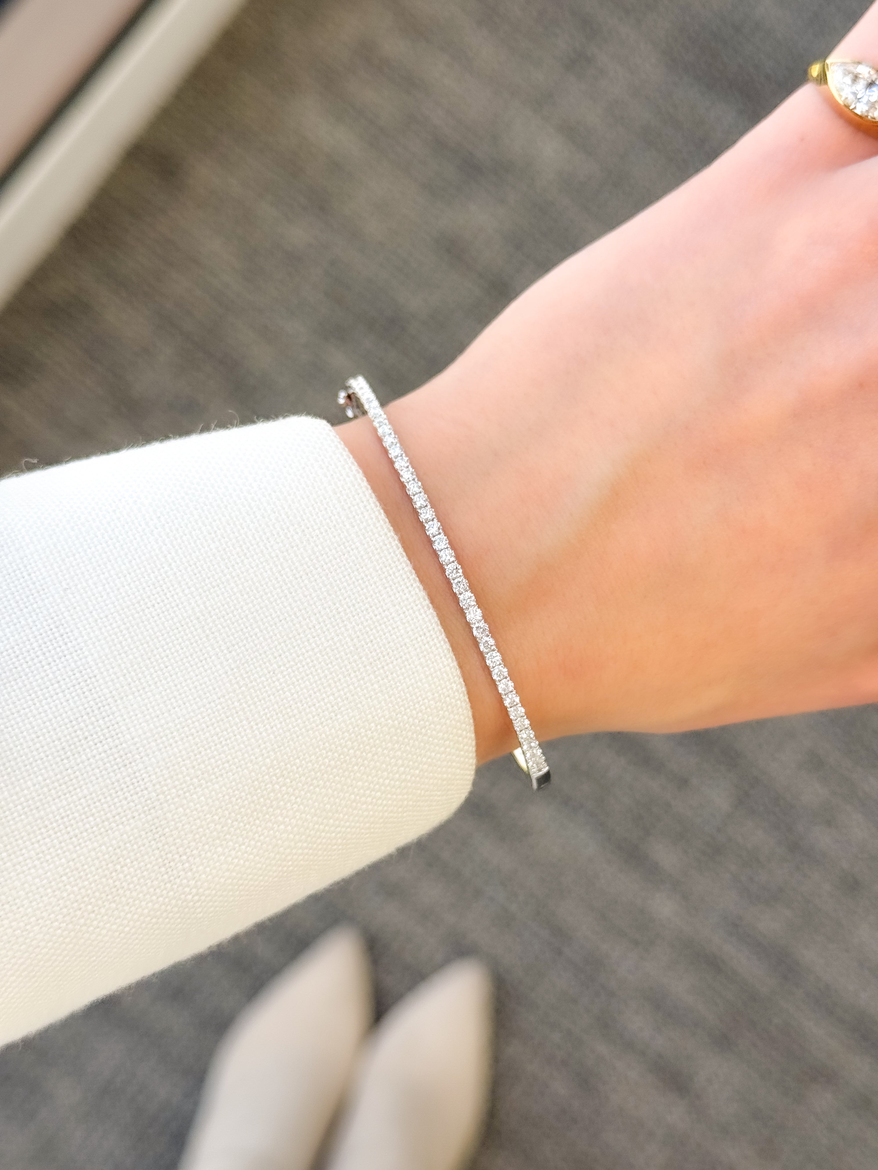 The Ace Essential, Classic Lab-grow diamond or natural diamond Bangle handcrafted in 14K Gold, 18K Gold, or Platinum by Earthena Jewelry of Beverly Hills, California.