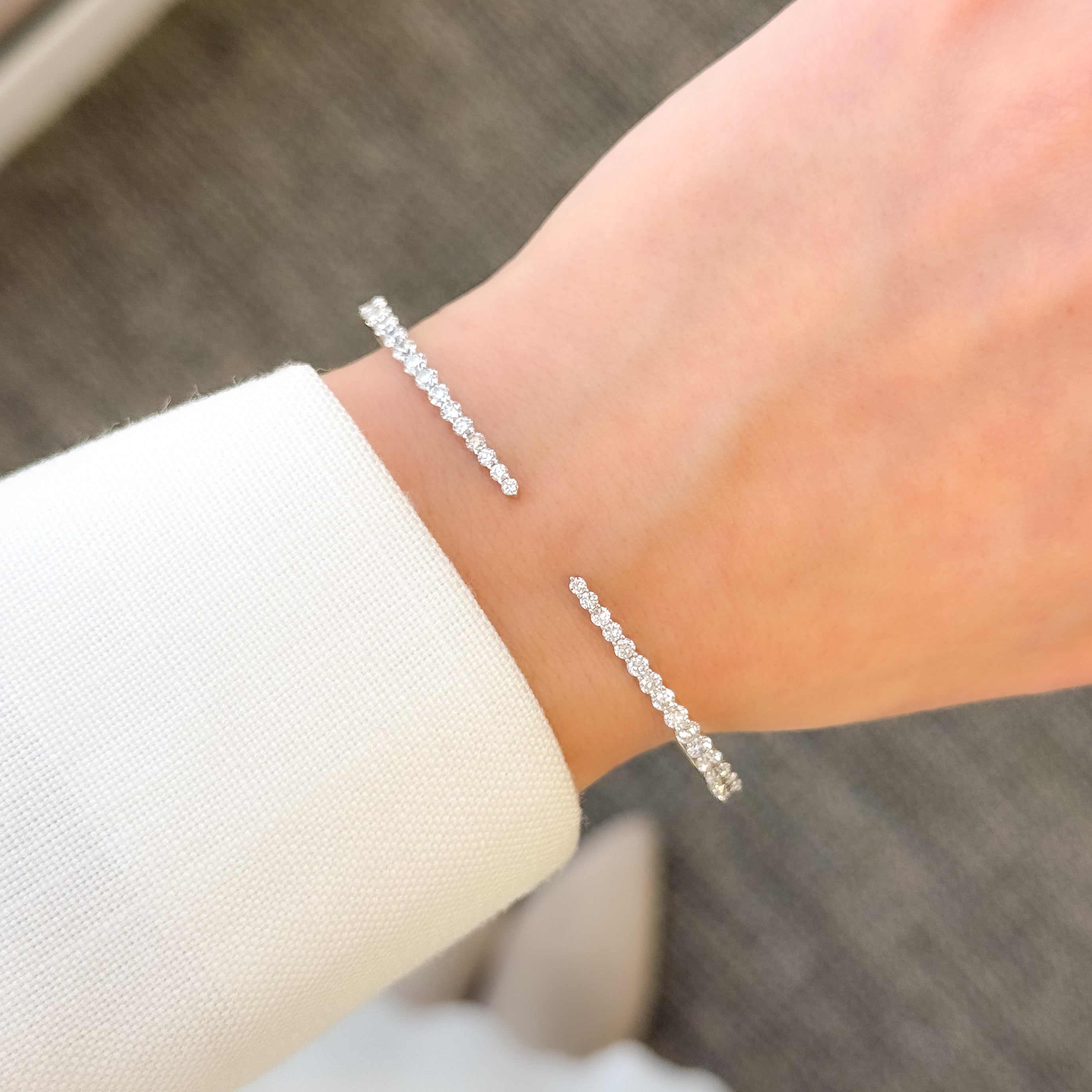 The Audrey, Graduated Open Cuff Diamond Bangle by Earthena Jewelry of Beverly Hills, California.