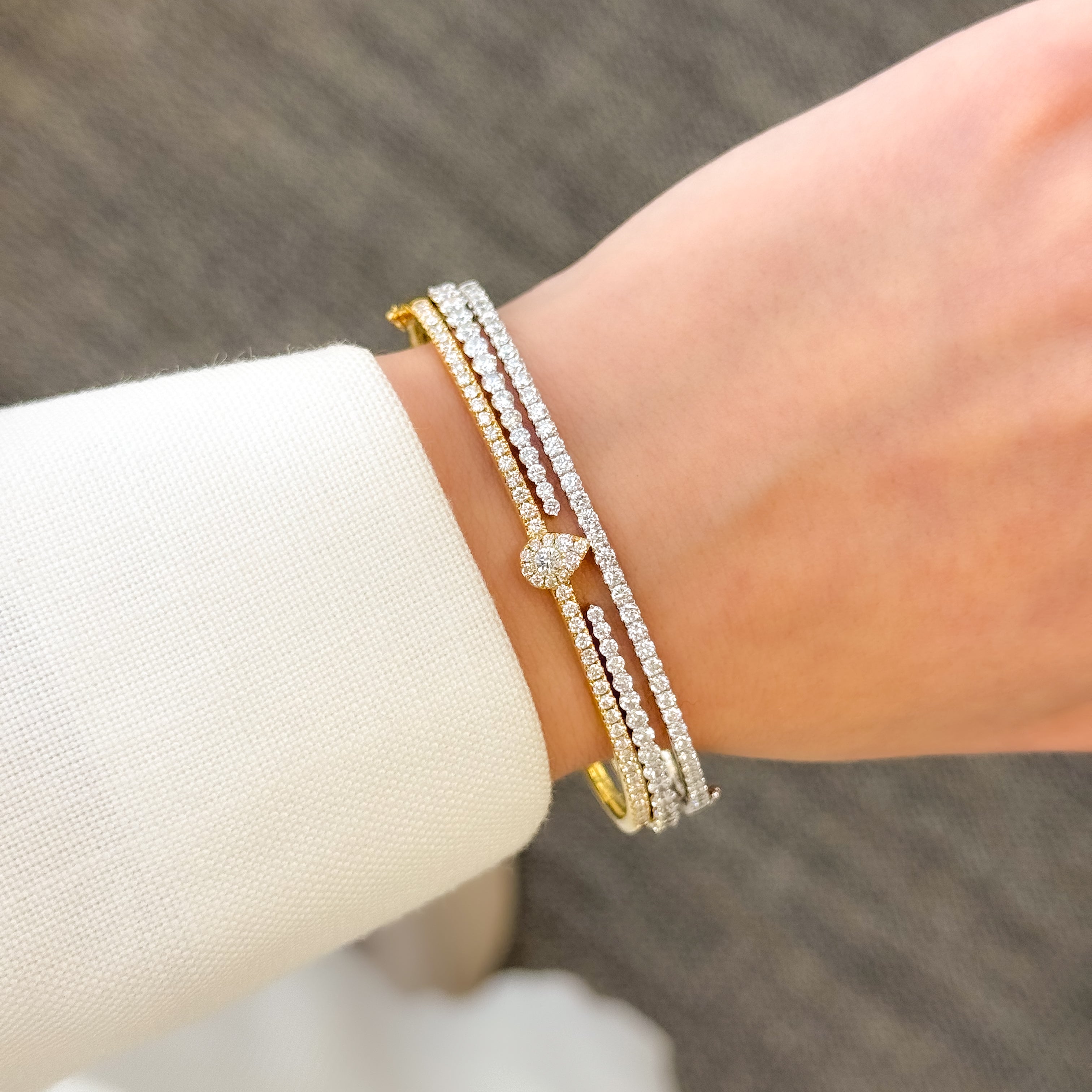 The Alia, Cluster Diamond Pear Shaped Bangle Lab-grown Diamond or Natural Diamond Band handcrafted in 14K Gold, 18K Gold or Platinum by Earthena Jewelry of Beverly Hills, California.