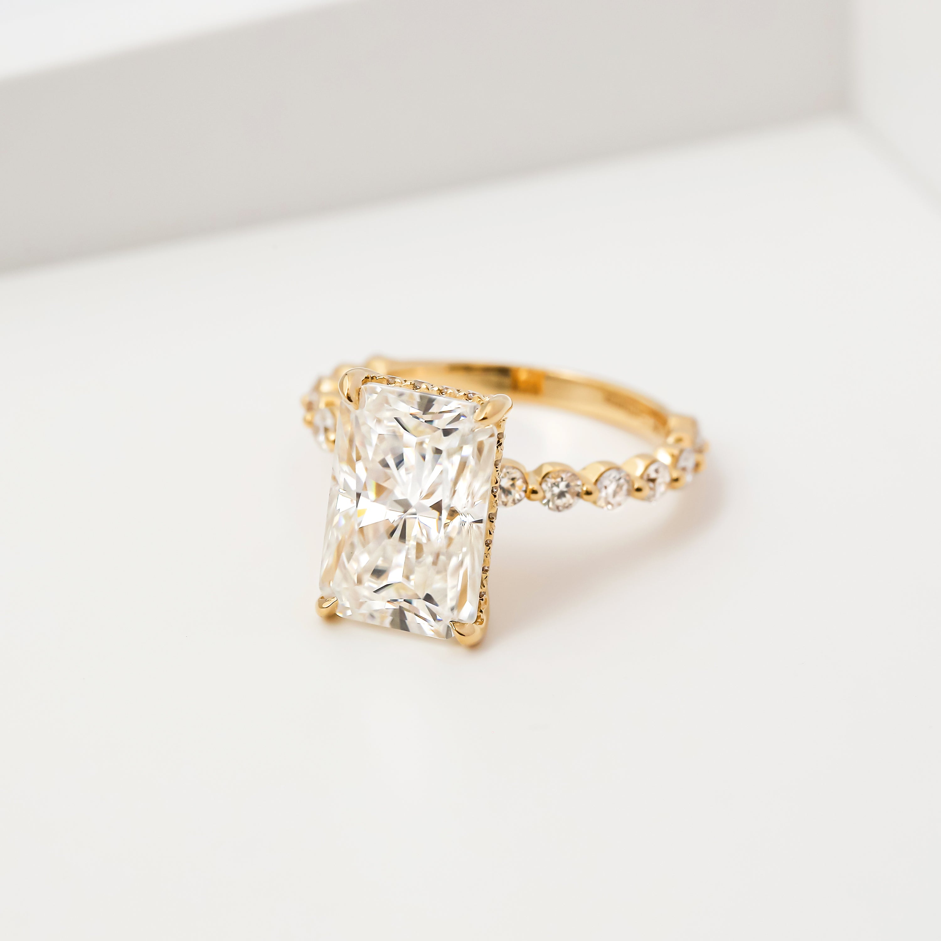 Classic Luna 4.5ct Elongated Radiant-cut Moissanite Hidden Halo Floating Lab-grown Diamond Engagement ring in 14K Gold, 18K Gold, or Platinum handcrafted in Los Angeles by Earthena Jewelry.