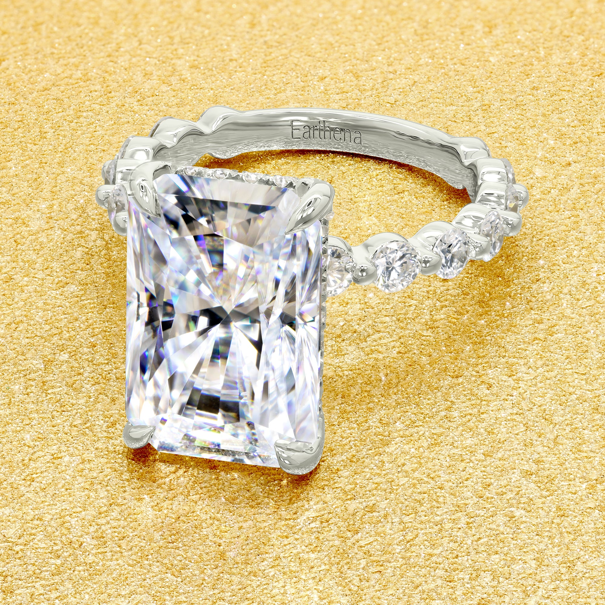 Classic Luna 5.5ct Elongated Radiant-cut Moissanite Hidden Halo Floating Lab-grown Diamond Engagement ring in 14K Gold, 18K Gold, or Platinum by Earthena Jewelry of Beverly Hills.