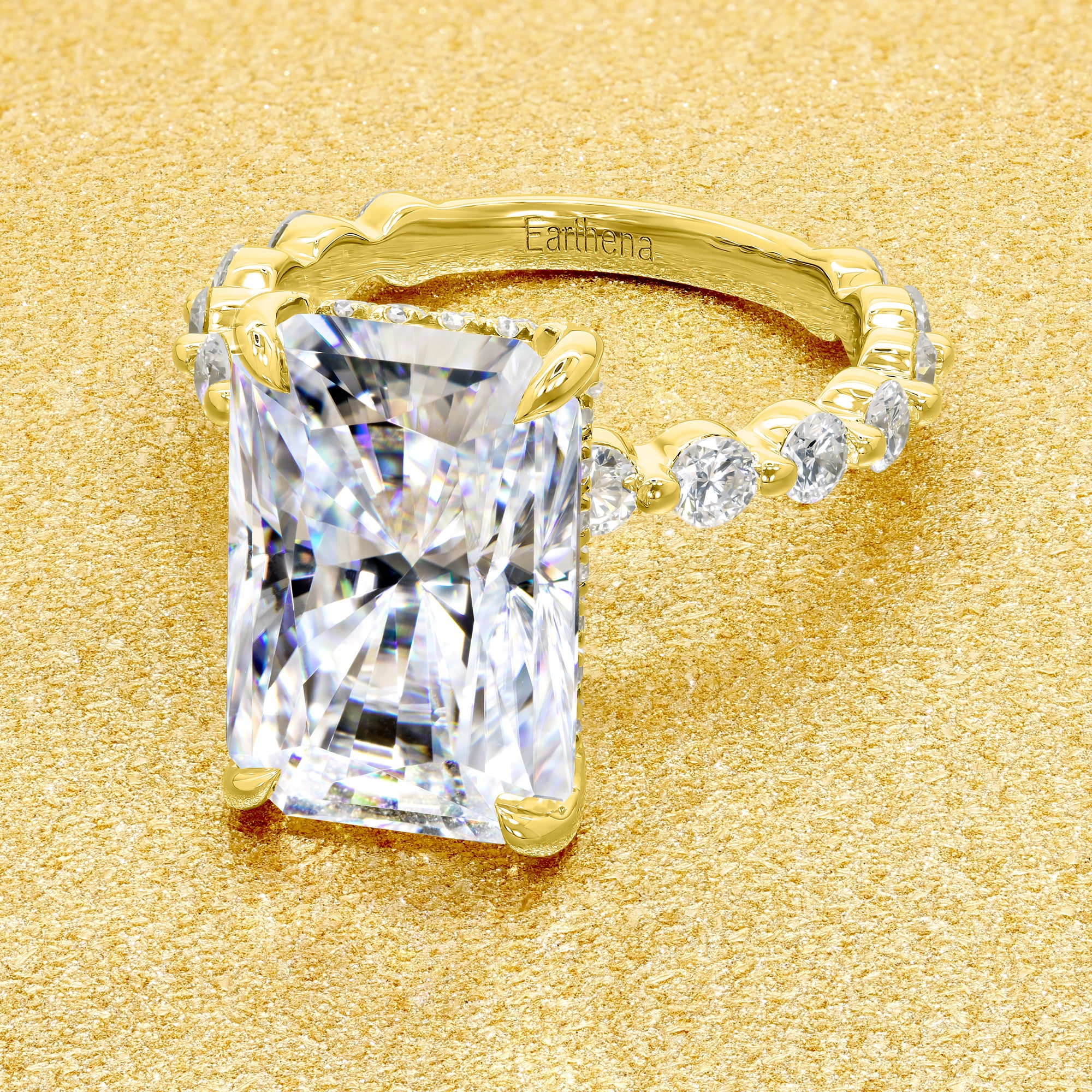 Classic Luna 5.5ct Elongated Radiant-cut Moissanite Hidden Halo Floating Lab-grown Diamond Engagement ring in 14K Gold, 18K Gold, or Platinum by Earthena Jewelry of Beverly Hills.