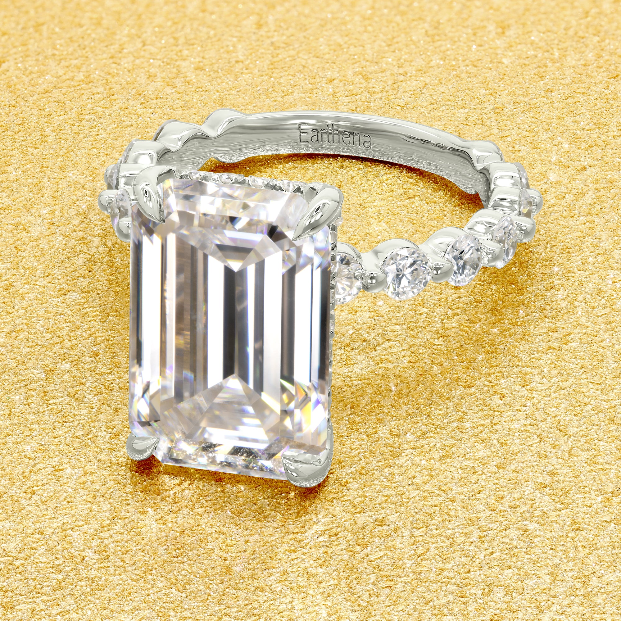 Classic Luna 6.5ct Elongated Emerald-cut Moissanite Hidden Halo Floating Lab-grown Diamond Engagement ring in 14K Gold, 18K Gold, or Platinum by Earthena Jewelry of Beverly Hills.