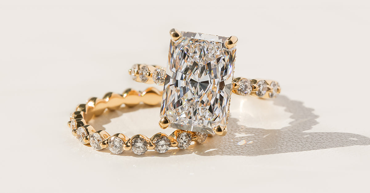 Elongated Radiant cut Diamond Luna hidden halo Engagement Ring by Earthena Jewrlry of Beverly Hills.