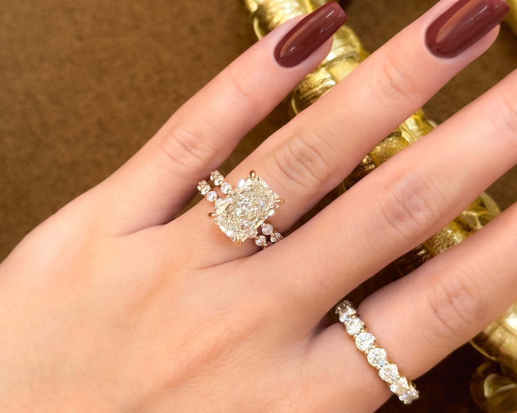 Classic Luna 5.25ct Elongated Radiant-cut Lab-grown Diamond Hidden Halo Floating Engagement ring in 14K Gold, 18K Gold, or Platinum by Earthena Jewelry of Beverly Hills.