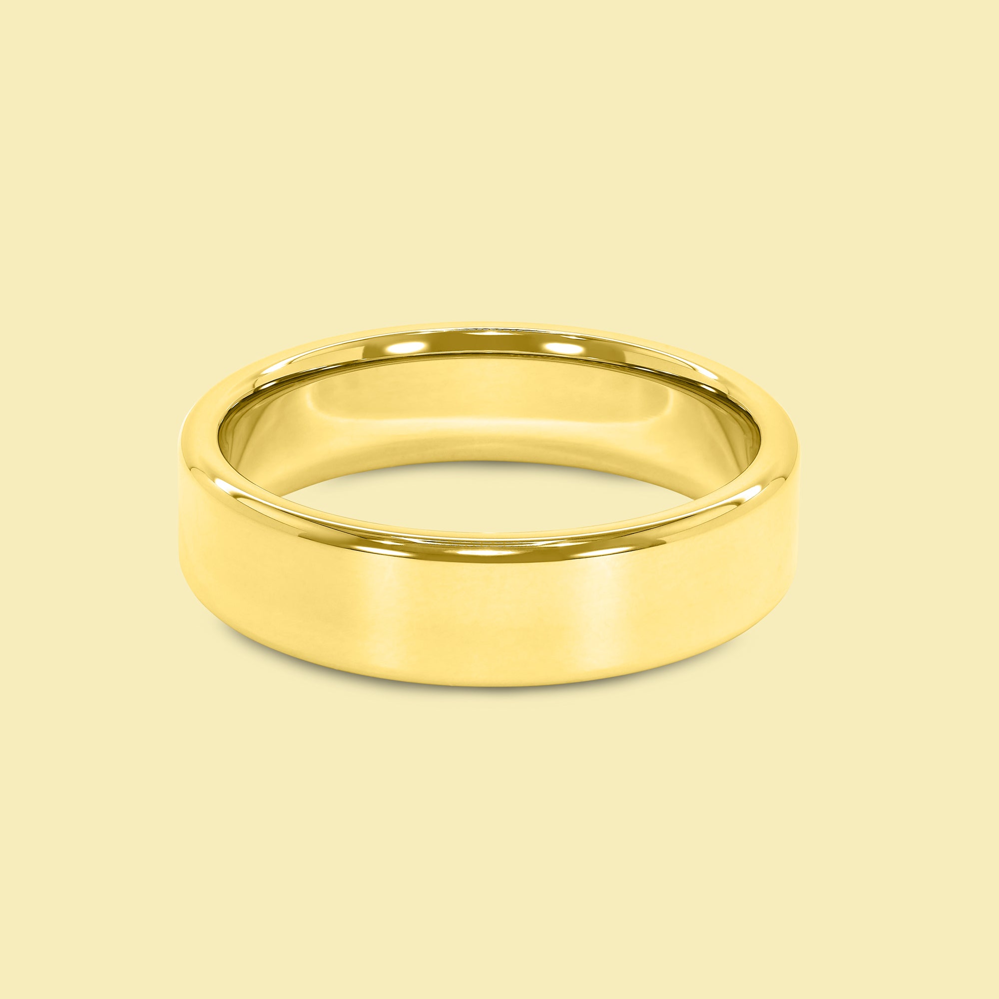 The Milo Solid Gold 6mm Flat-Top Rounded Edge High Polish Comfort Fit Men's Wedding Band in 14K Gold, 18K Gold, or Platinum by Earthena Jewelry of Beverly Hills.
