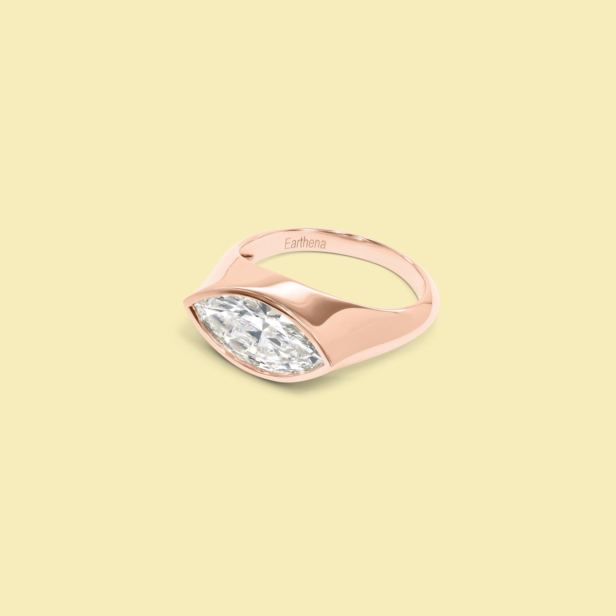 The Muse Bezel-set Marquise Diamond Pinky Ring in 14K, 18K Gold or Platinum | Lab-Grown or Earth-Mined by Earthena Jewelry of Beverly Hills handcrafted in Los Angeles, California.