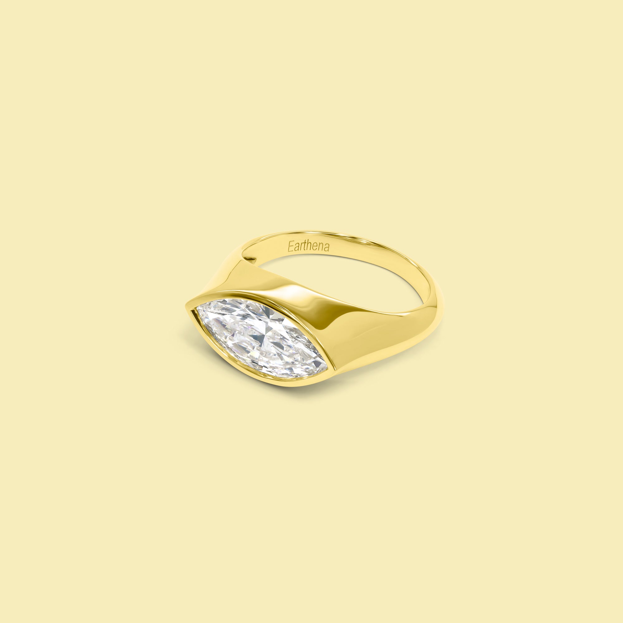The Muse Bezel-set Marquise Diamond Pinky Ring in 14K, 18K Gold or Platinum | Lab-Grown or Earth-Mined by Earthena Jewelry of Beverly Hills handcrafted in Los Angeles, California.