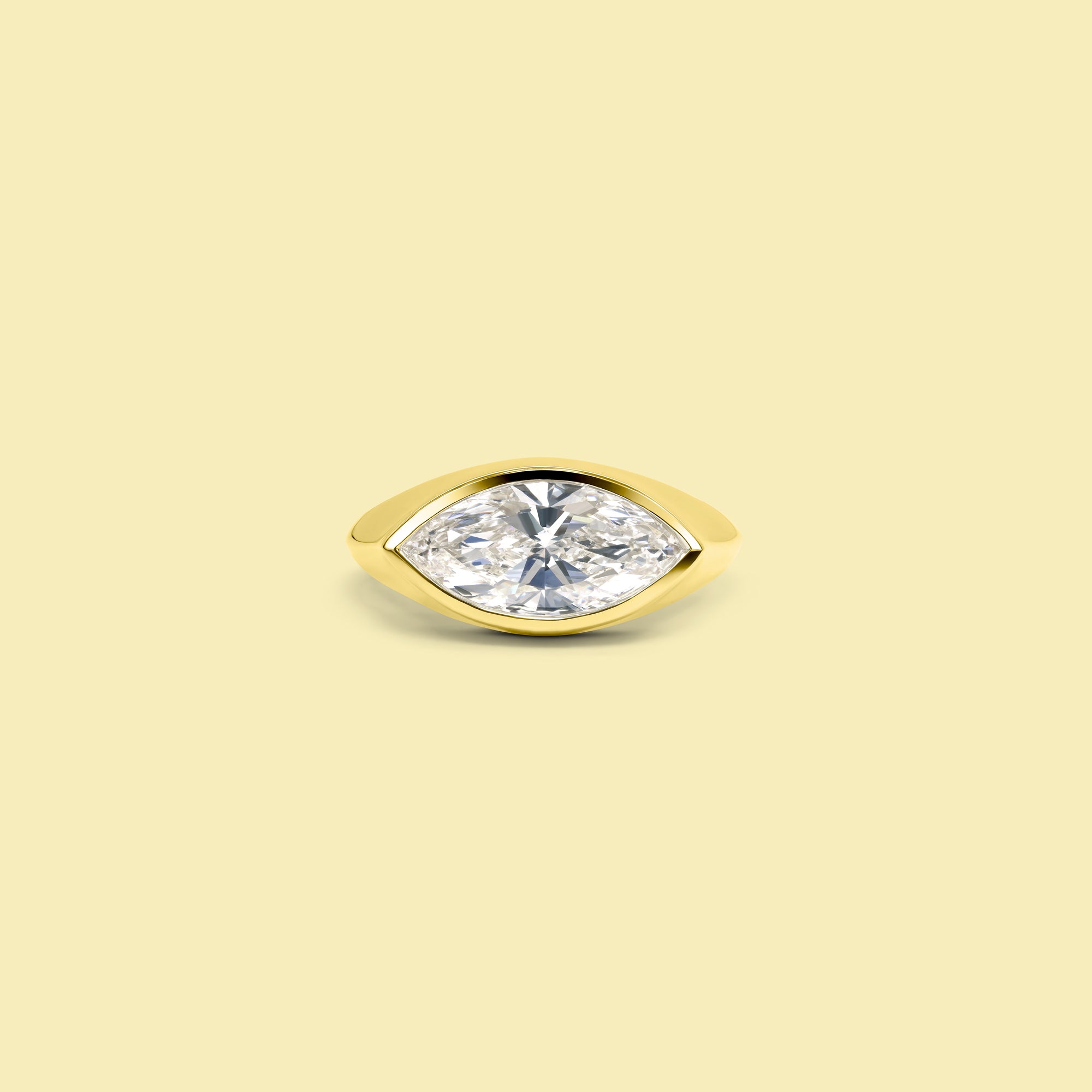 The Muse Bezel-set Marquise Diamond Pinky Ring in 14K, 18K Gold or Platinum | Lab-Grown or Earth-Mined by Earthena Jewelry of Beverly Hills handcrafted in Los Angeles, California.