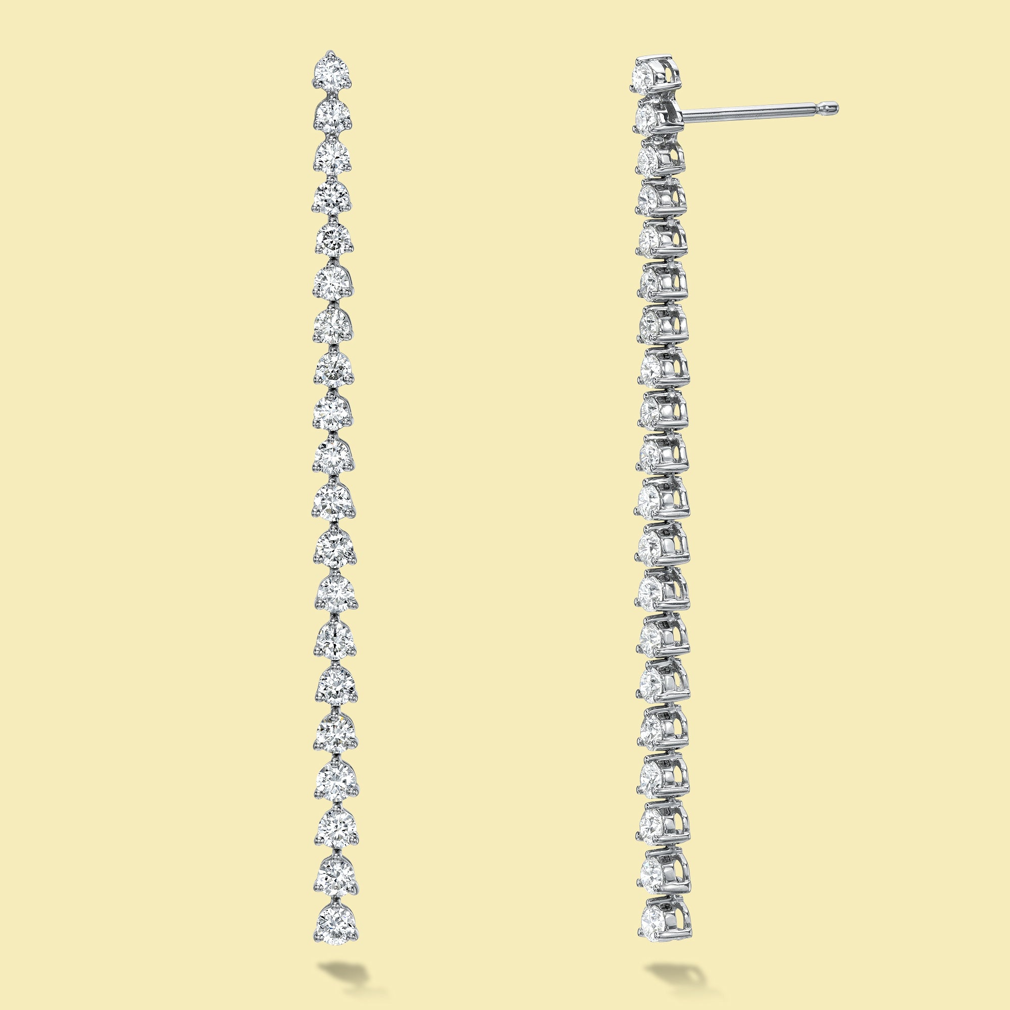 The Naomi, Dangle Drop Diamond Earrings are handcrafted in 14K gold, 18K gold, or Platinum by Earthena Jewelry in Los Angeles