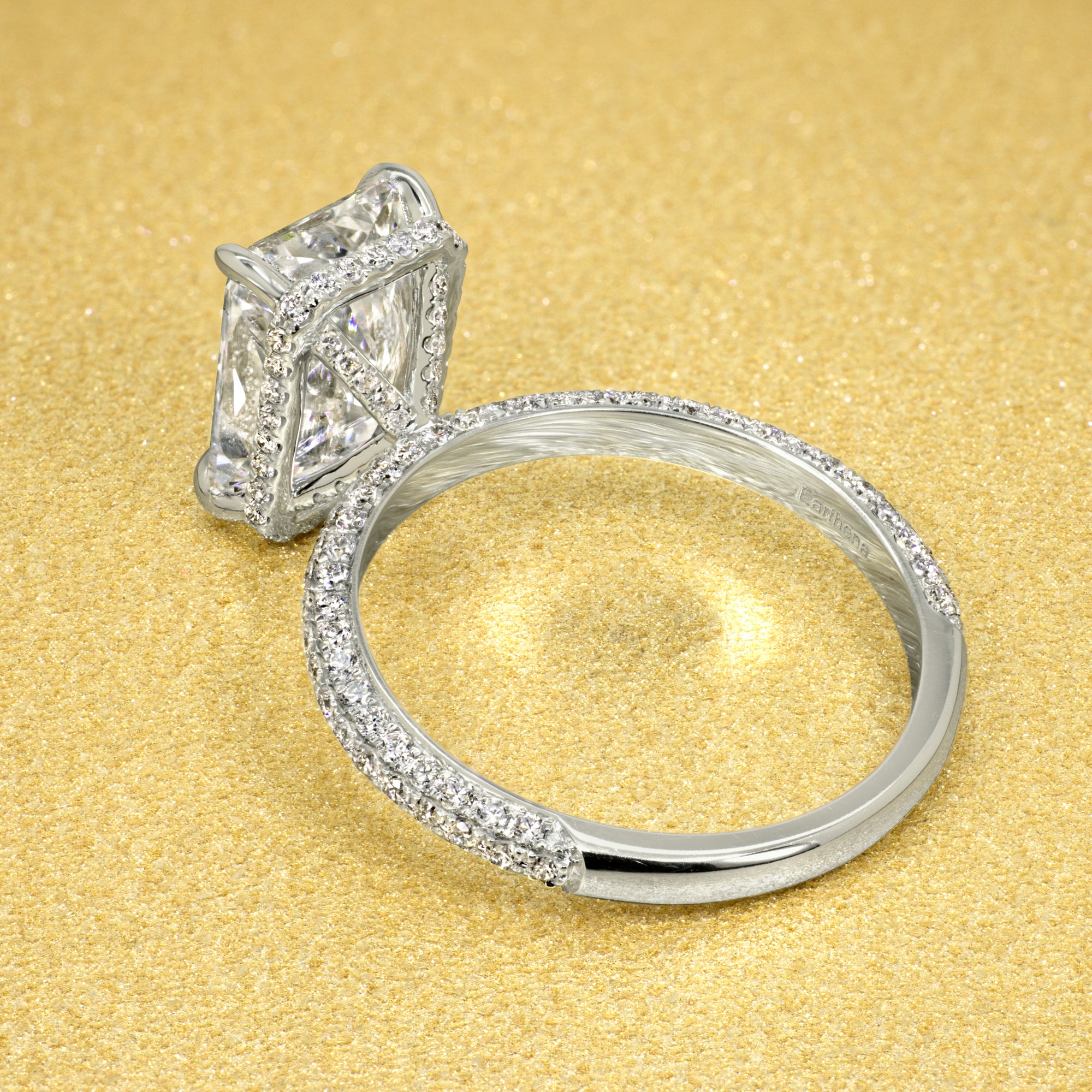 The Olivia, 5.5ct Elongated Emerald-cut Moissanite Triple Row Hidden Wrap Halo Ring