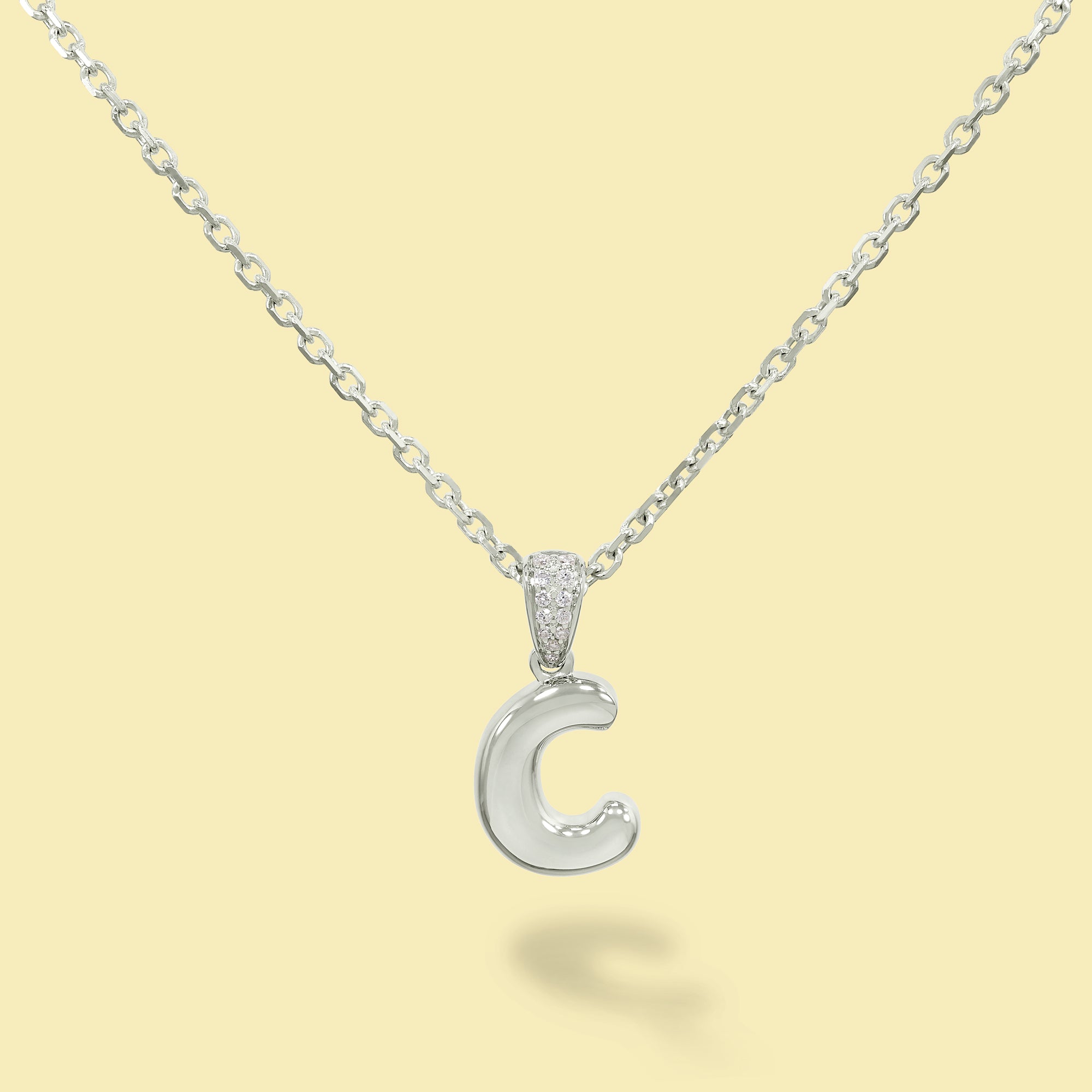 The Cloud, Gold Initial Diamond Puff Pendant Necklace handcrafted in 14K Gold by Earthena Jewelry of Beverly Hills, California.
