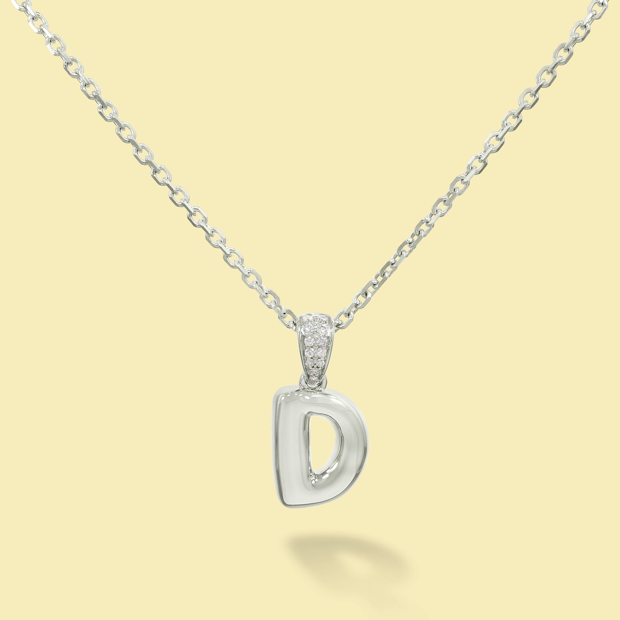 The Cloud, Gold Initial Diamond Puff Pendant Necklace handcrafted in 14K Gold by Earthena Jewelry of Beverly Hills, California.