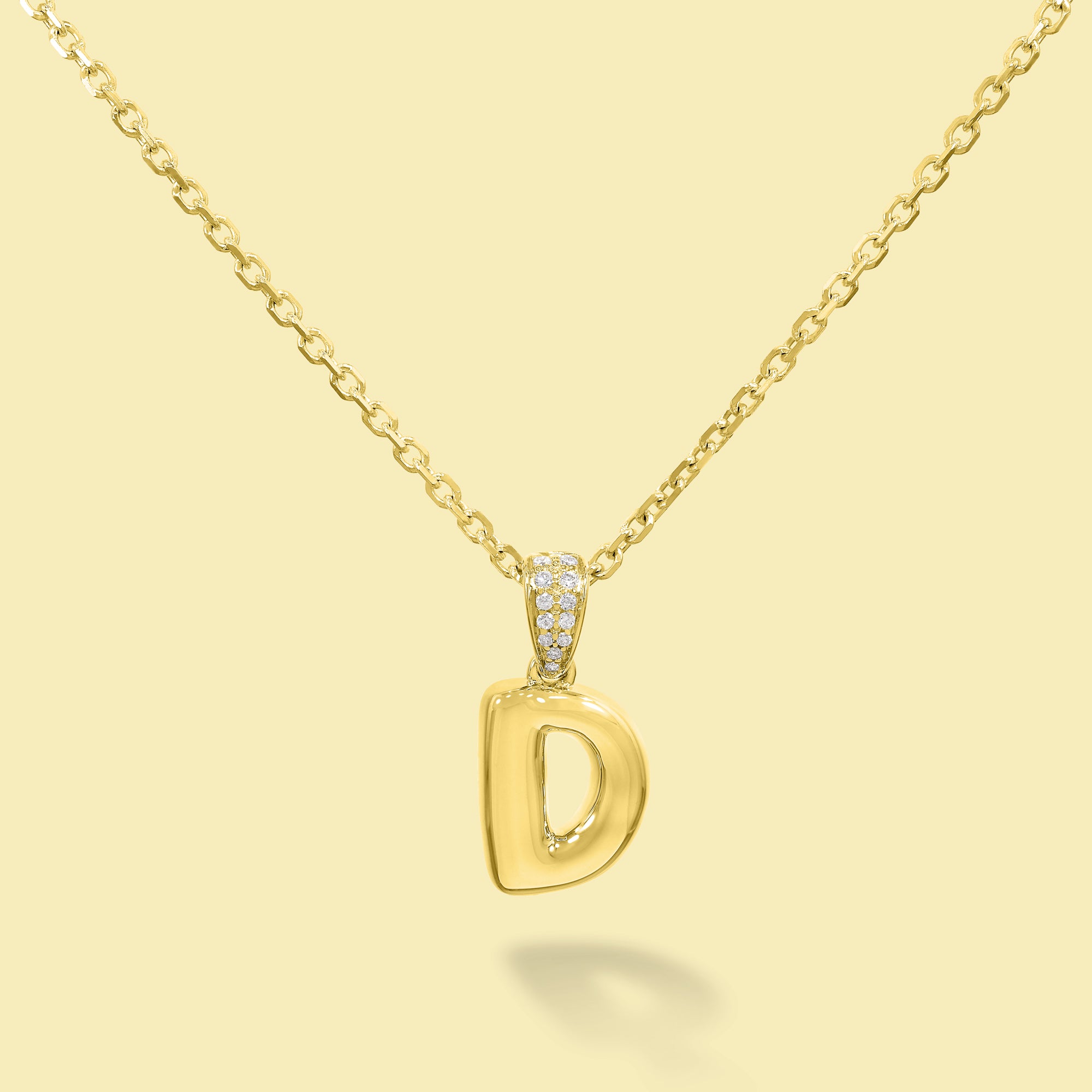 The Cloud, Gold Initial Diamond Puff Pendant Necklace handcrafted in 14K Gold by Earthena Jewelry of Beverly Hills, California.
