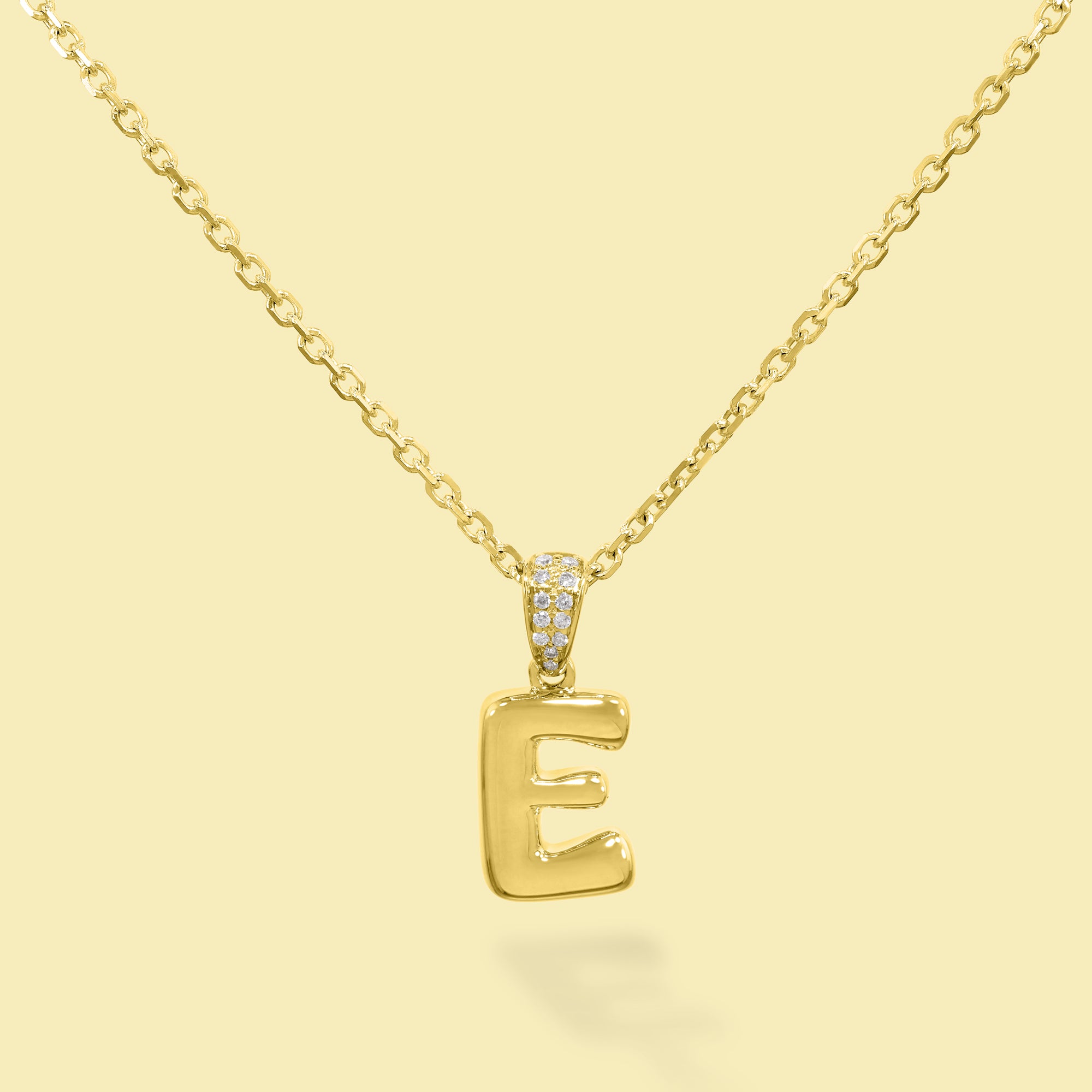The Cloud, Gold Initial Diamond Puff Pendant Necklace handcrafted in 14K Gold by Earthena Jewelry of Beverly Hills, California.