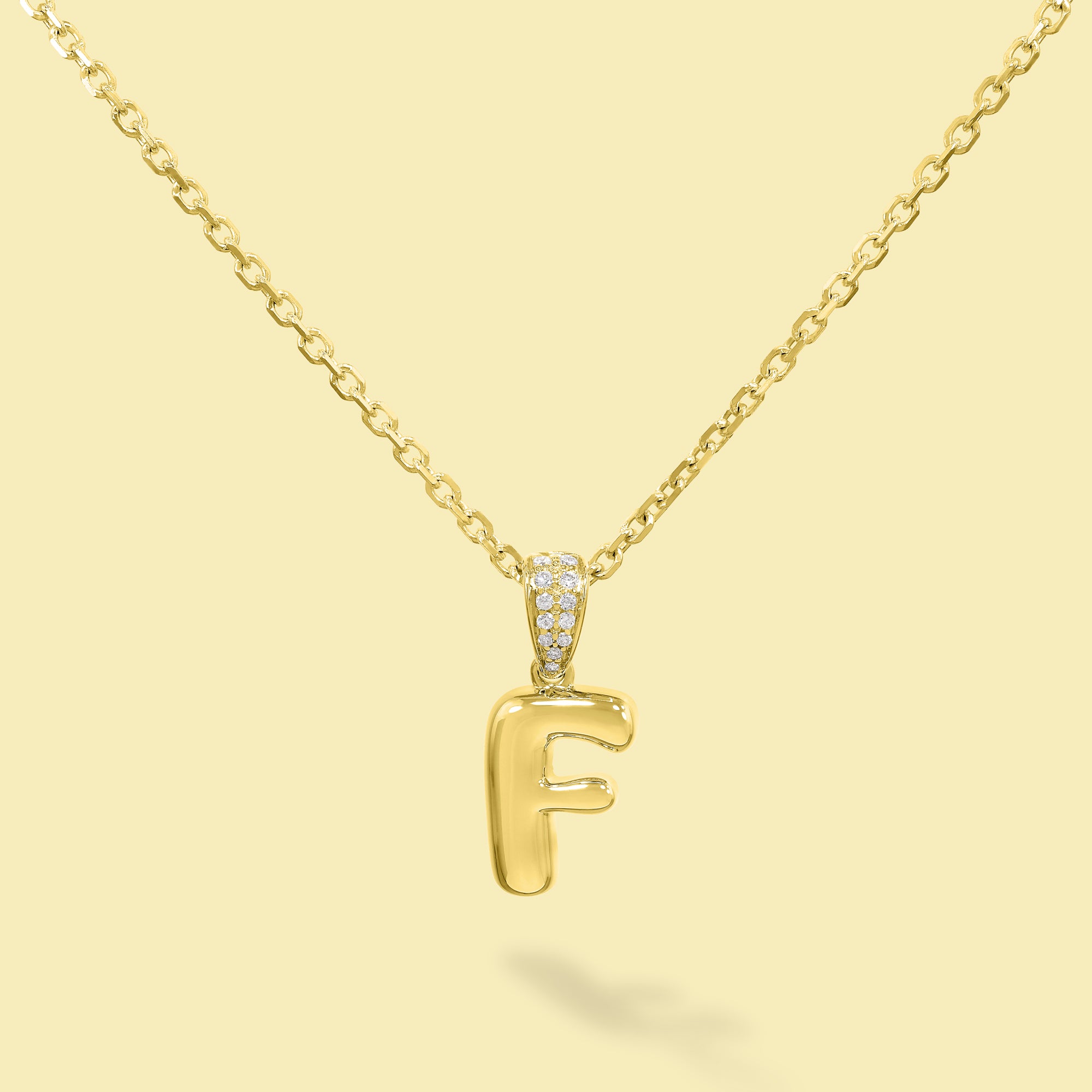 The Cloud, Gold Initial Diamond Puff Pendant Necklace handcrafted in 14K Gold by Earthena Jewelry of Beverly Hills, California.