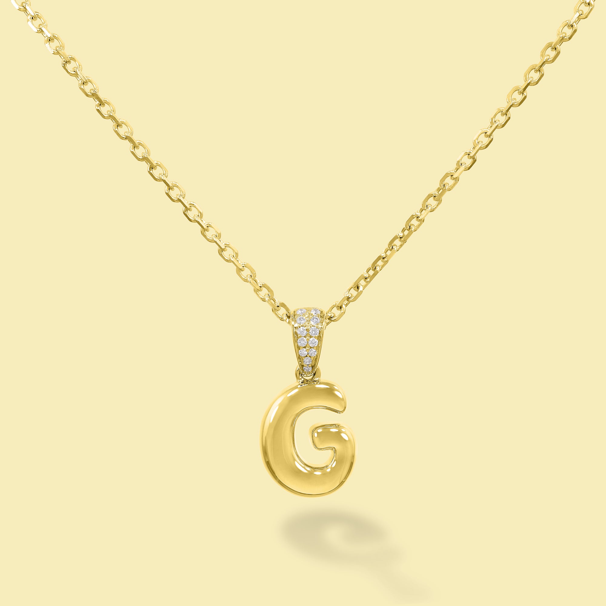 The Cloud, Gold Initial Diamond Puff Pendant Necklace handcrafted in 14K Gold by Earthena Jewelry of Beverly Hills, California.