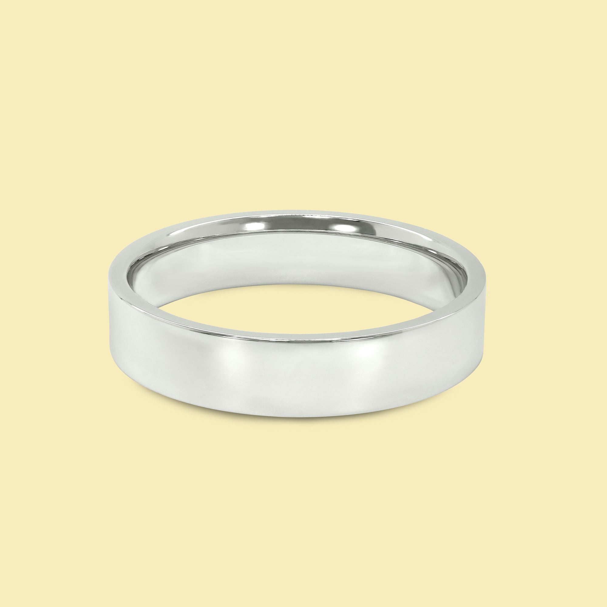 The Quinn Solid Gold 5mm Flat-Top Straight Edge Low Profile High Polish Comfort Fit Men's Wedding Band in 14K Gold, 18K Gold, or Platinum by Earthena Jewelry of Beverly Hills.